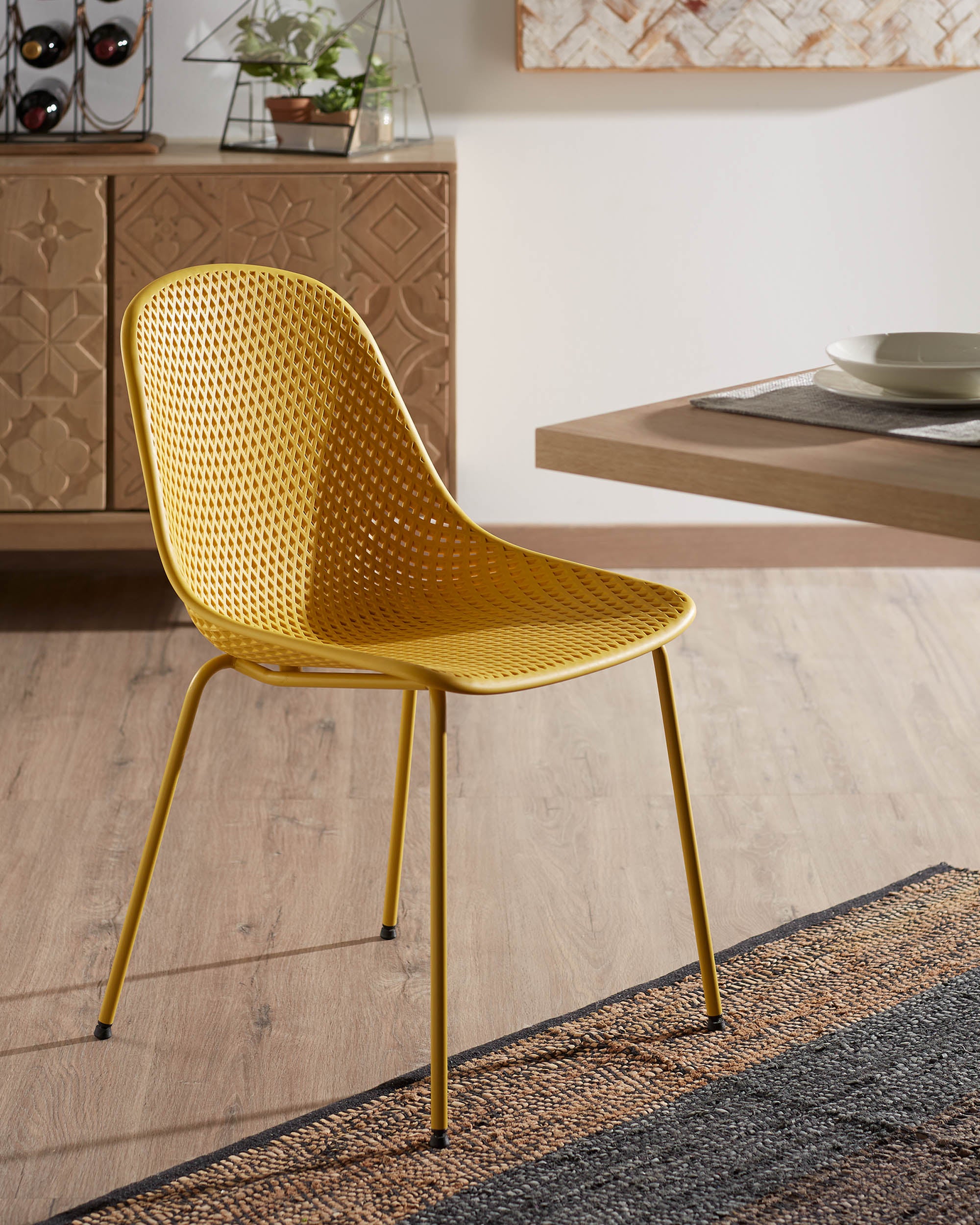 Quinby outdoor dining chair in yellow - Lifestyle