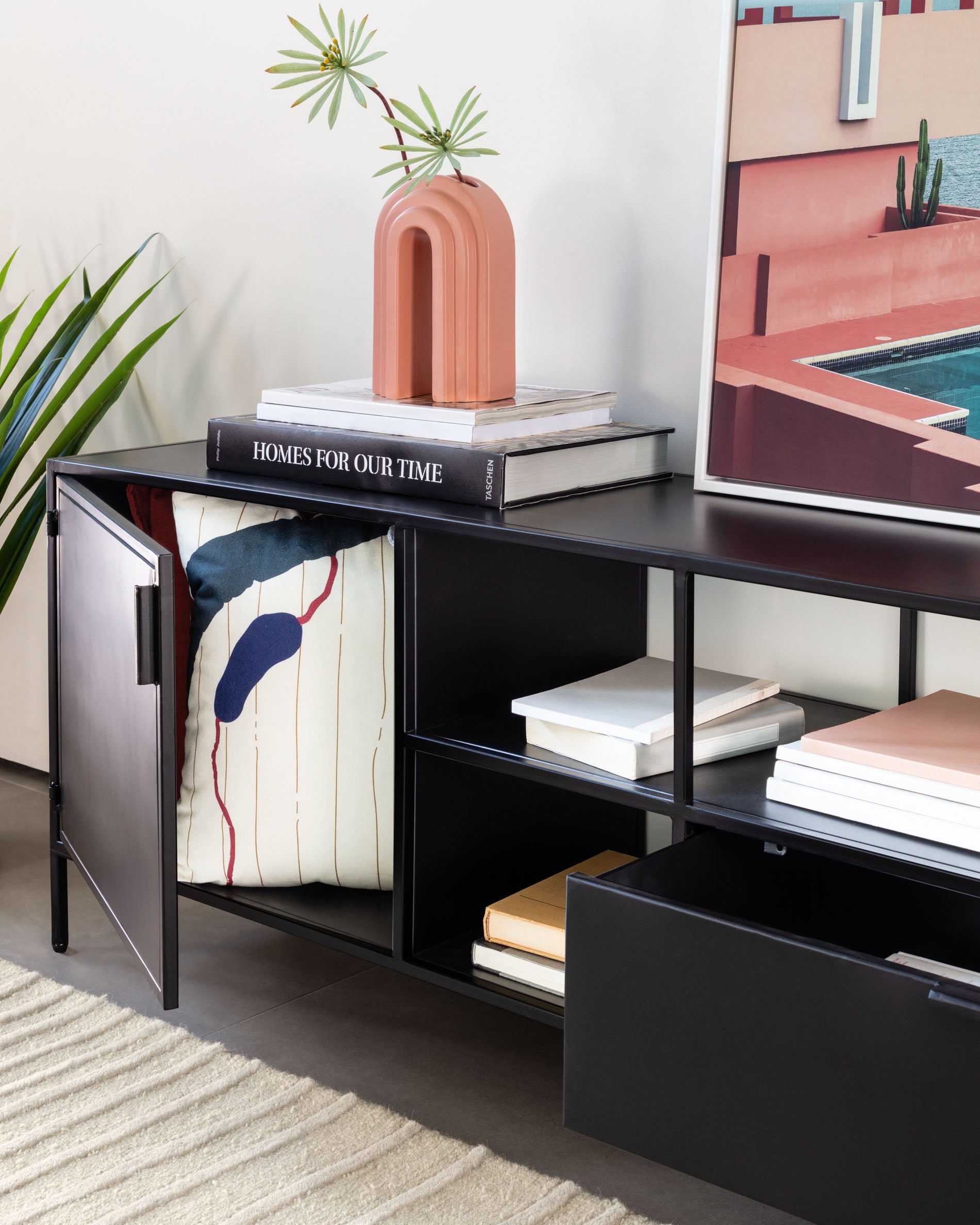 Shantay metal TV stand in a painted black finish with 1 door and drawer, 150 x 50 cm - Lifestyle