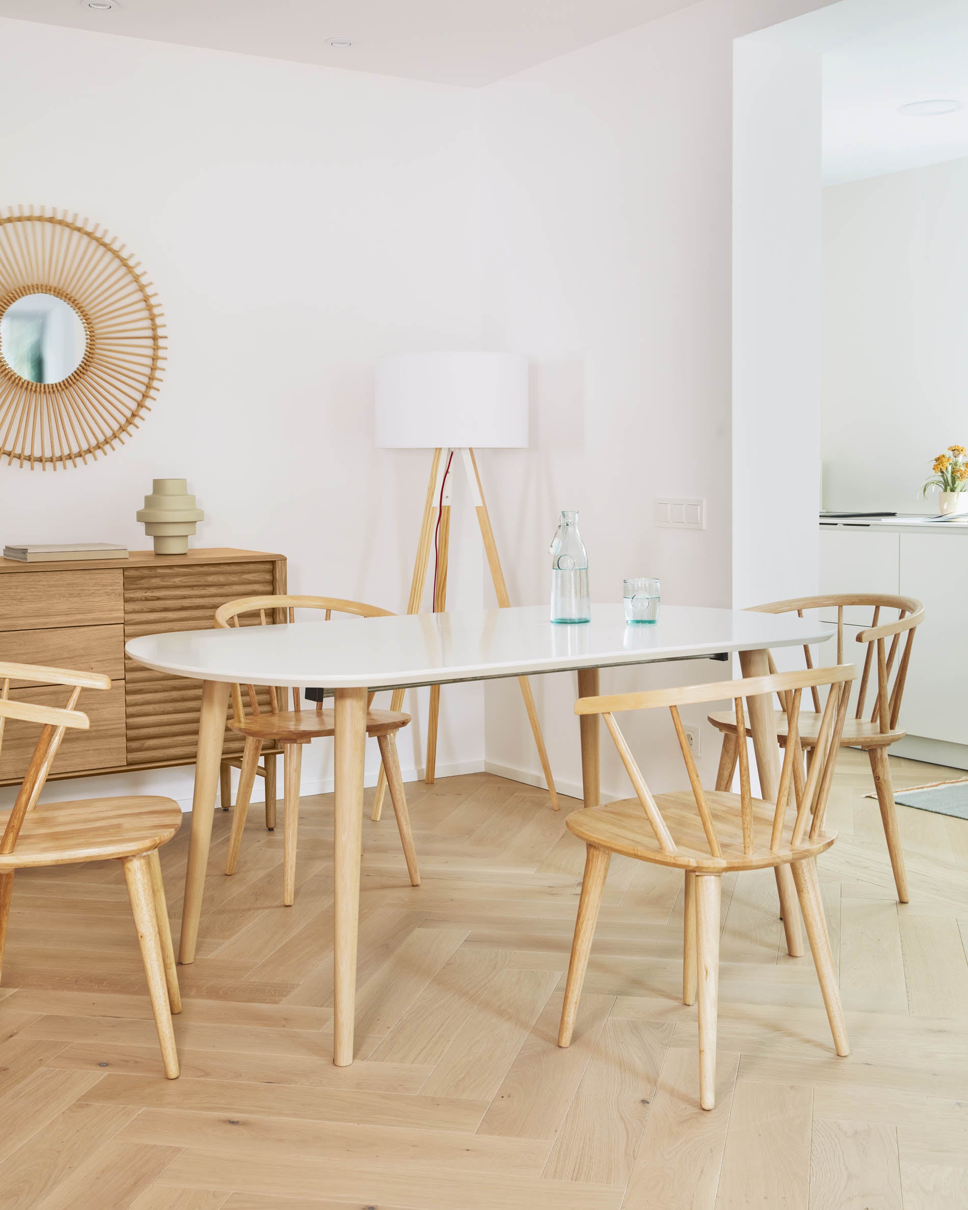 Oqui extendable oval table with an oak veneer and solid wood legs, Ø 160 (260) x 100 cm - Lifestyle