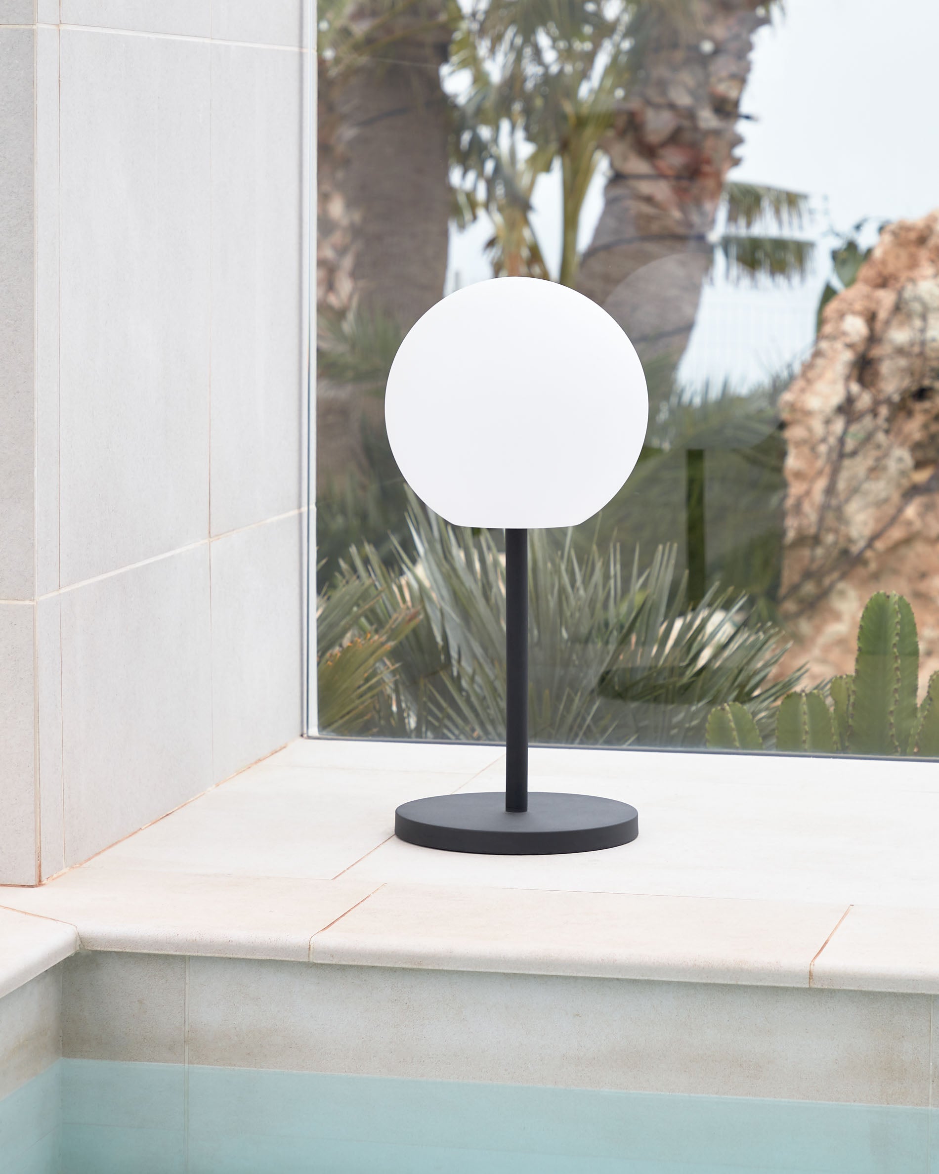 Outdoor Dinesh table lamp in black steel - Lifestyle