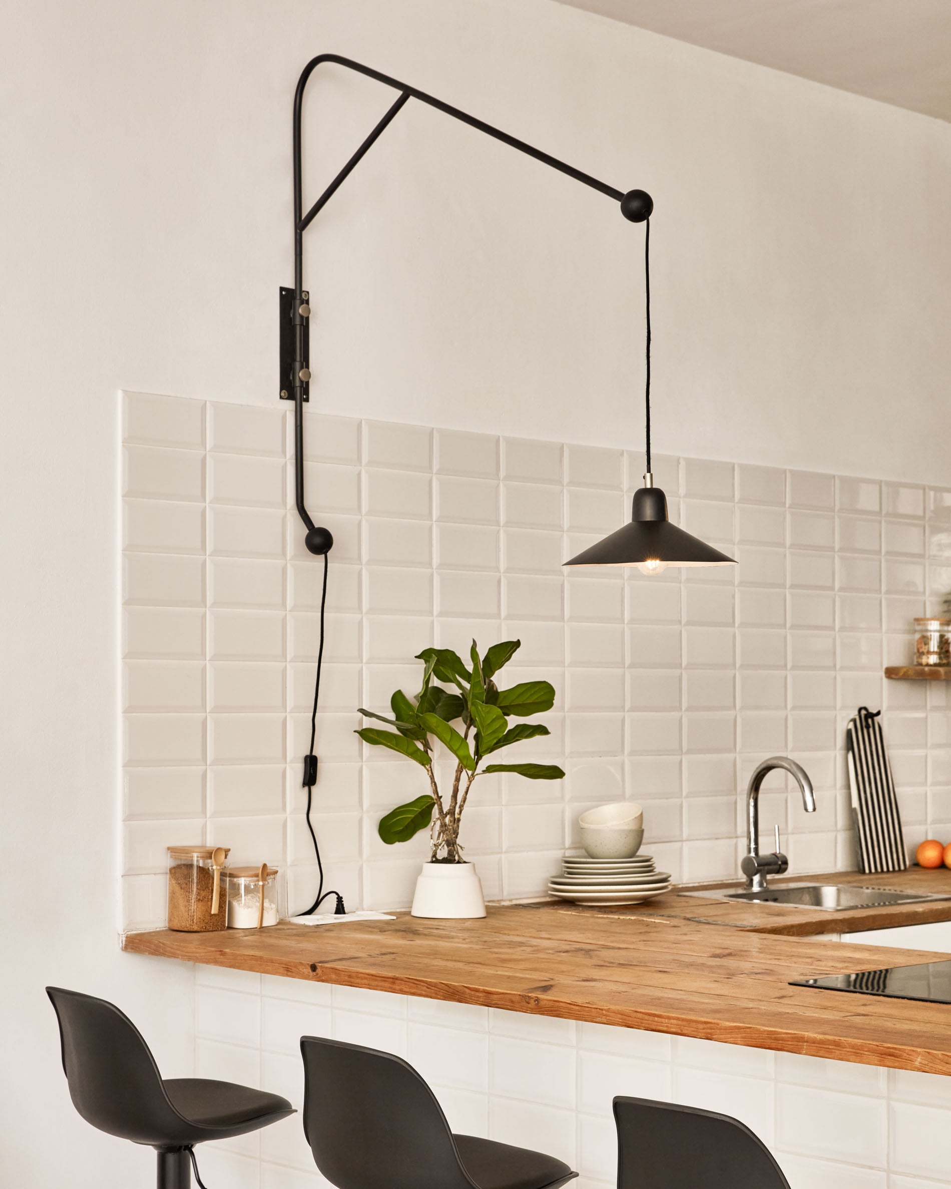 Eleazar wall light in metal with black painted finish - Lifestyle
