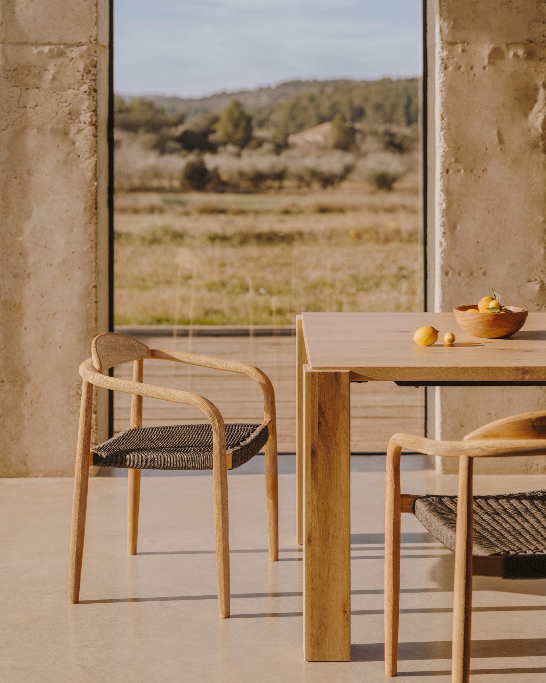Nina stackable chair in solid acacia wood and black rope seat FSC 100% - Lifestyle