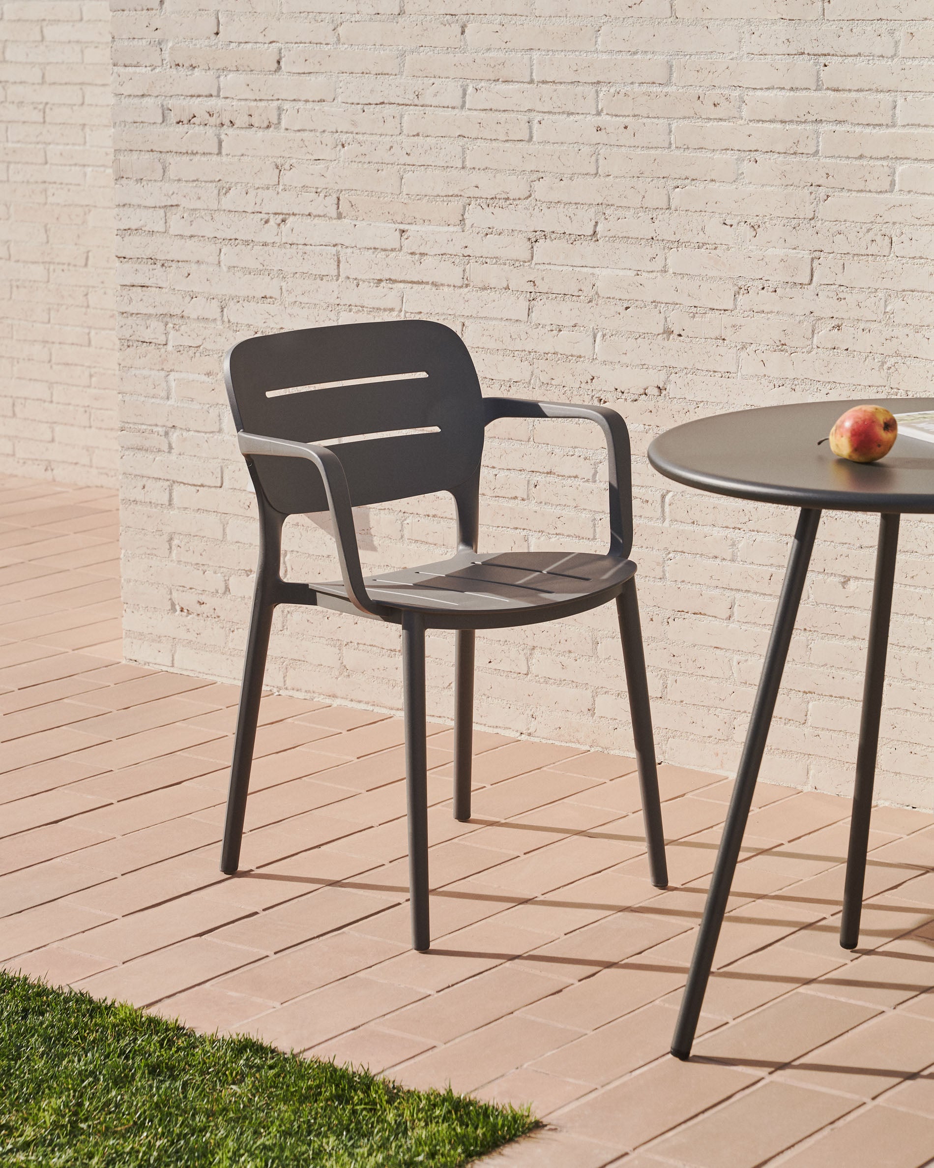 Morella stackable garden chair in grey - Lifestyle