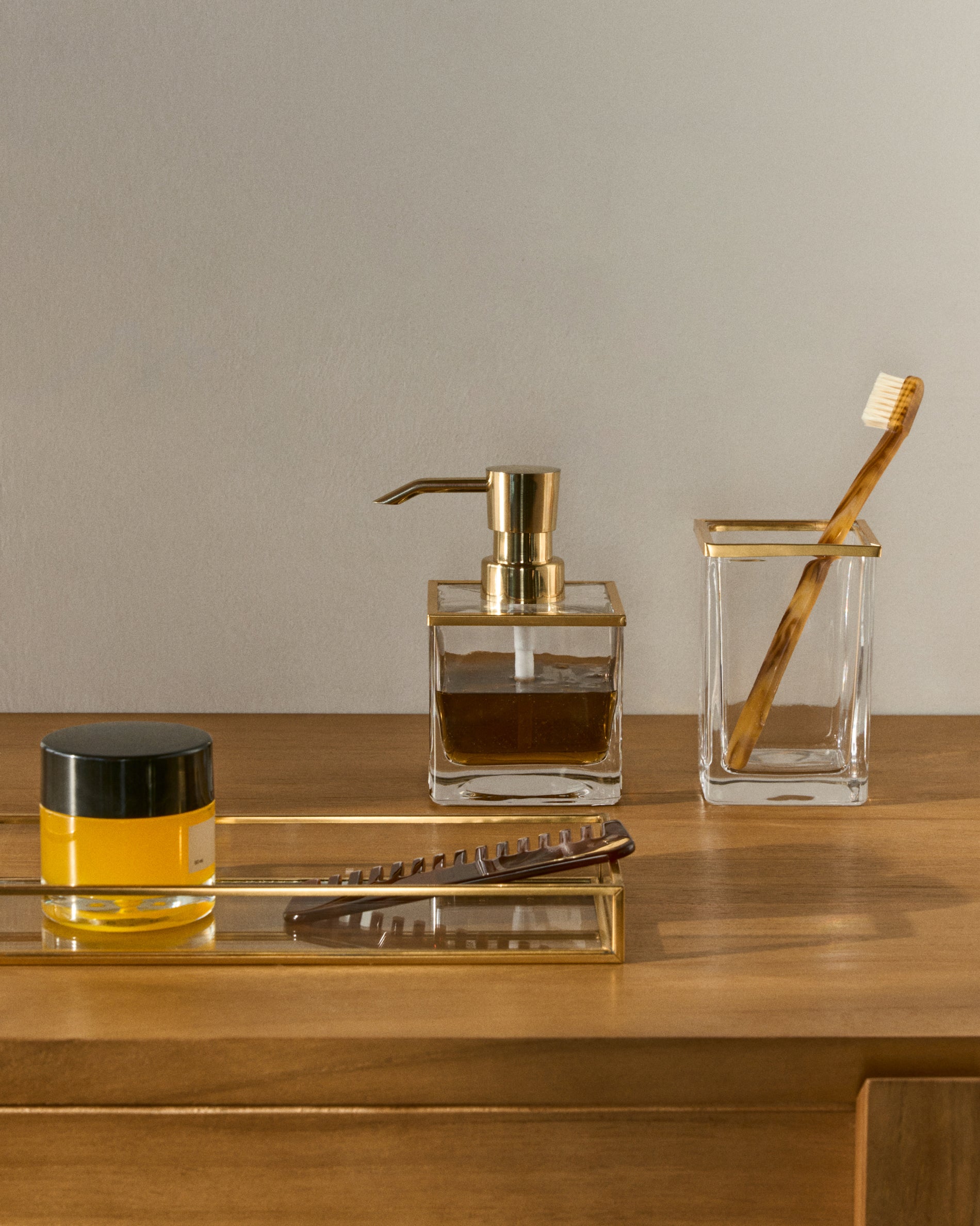 Soanet Glass and Metal Toothbrush Holder with Gold Finish - Lifestyle