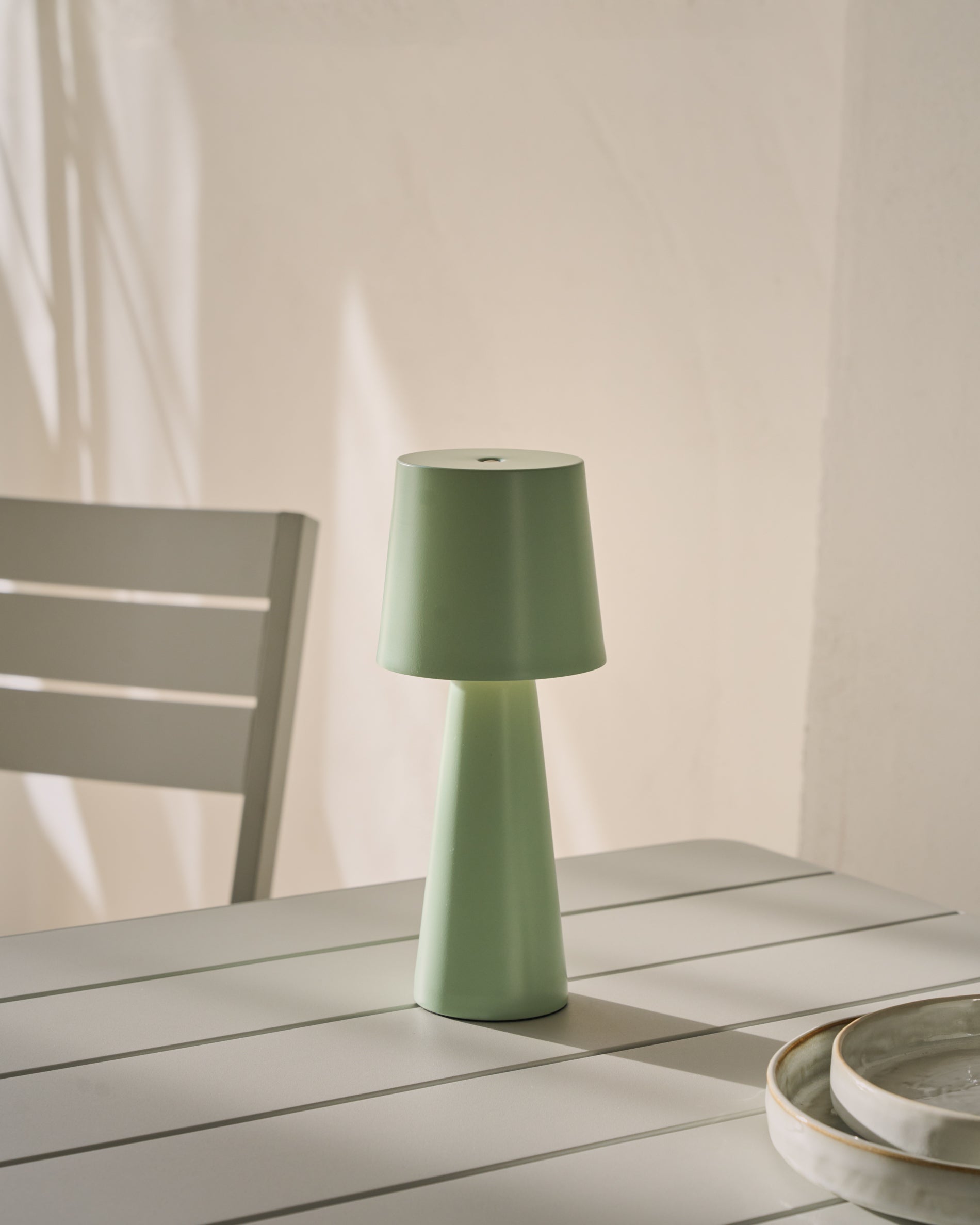 Arenys small outdoor metal table lamp in a turquoise painted finish - Lifestyle