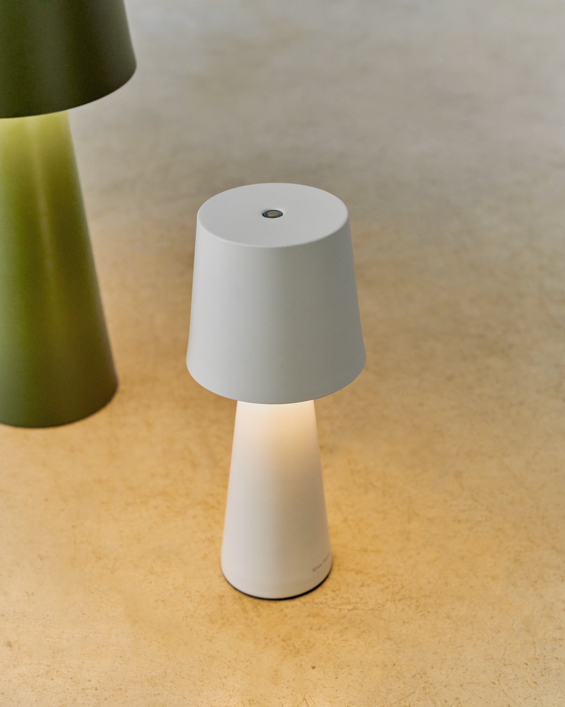 Arenys small outdoor metal table lamp in a grey painted finish - Lifestyle