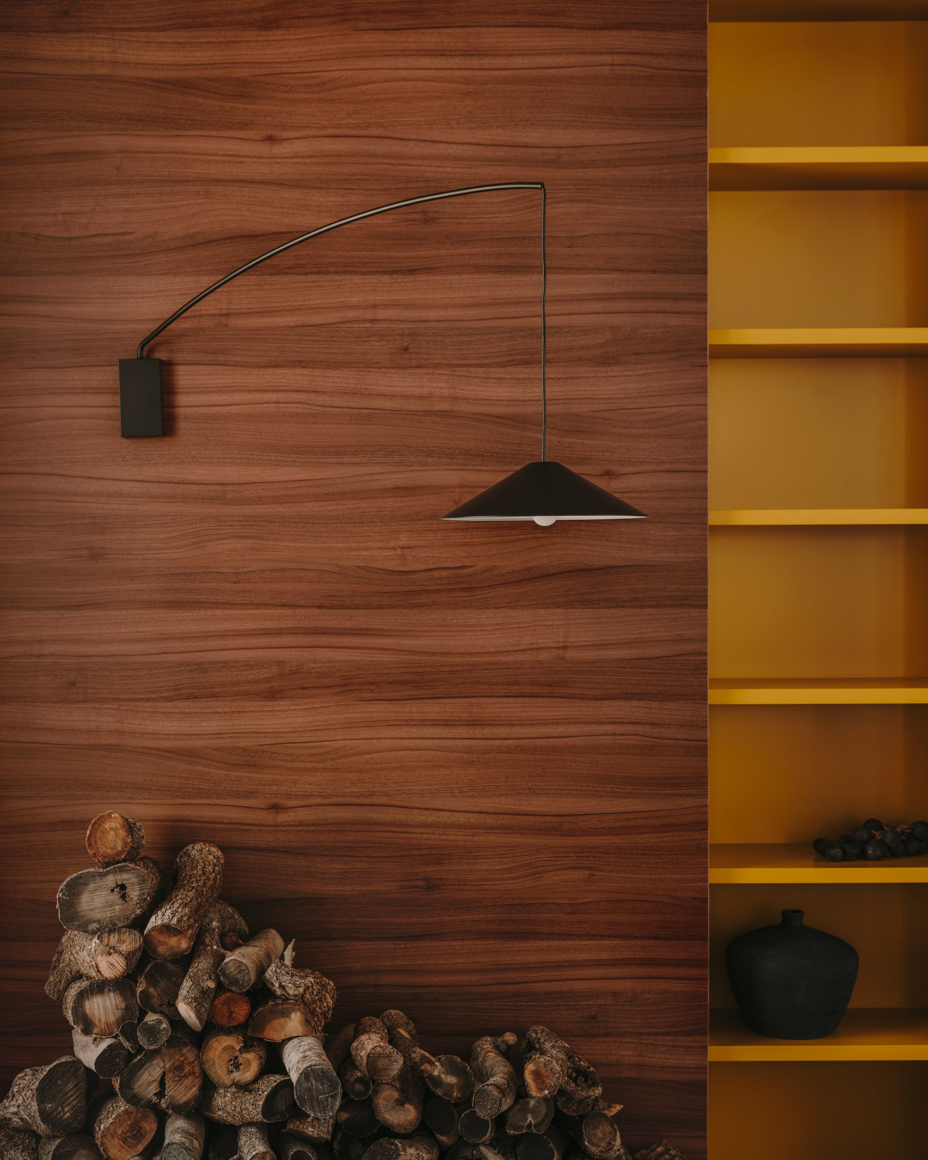 Kally wall lamp in a black painted finish - Lifestyle