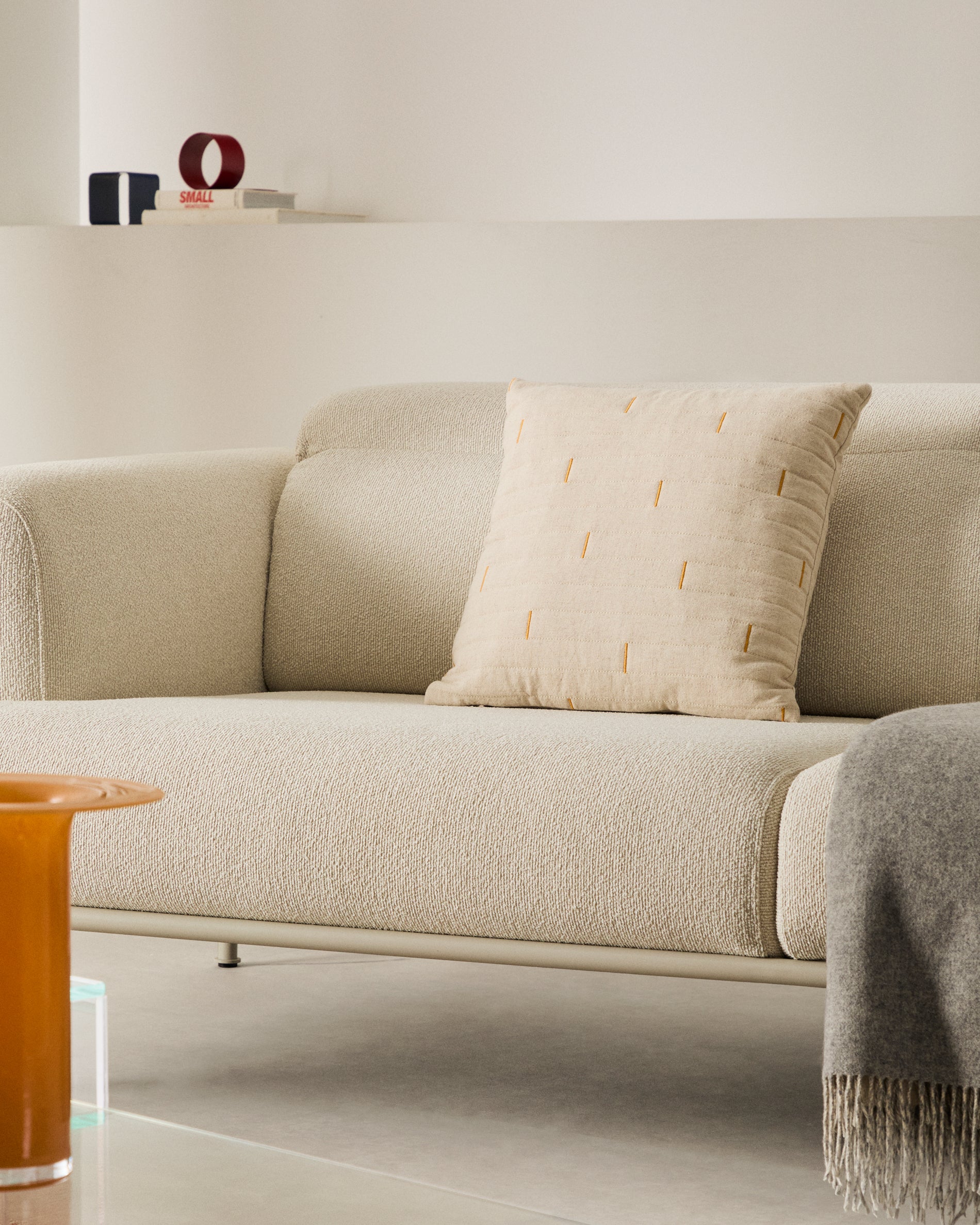 Blaina cushion cover in white linen with an orange embroidery feature, 45 x 45 cm - Lifestyle