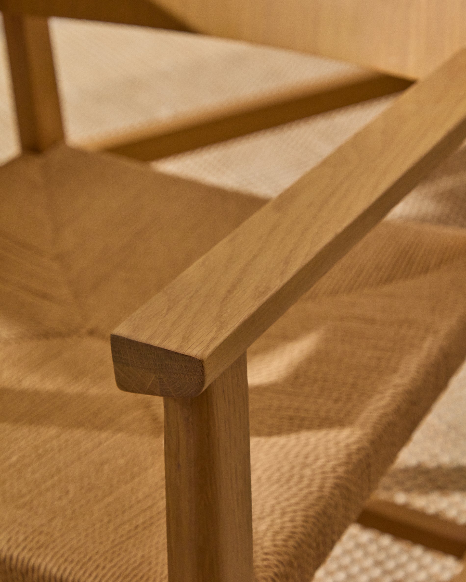 Idun chair made of FSC Mix Credit solid oak wood with natural tone finish and rope cord seat