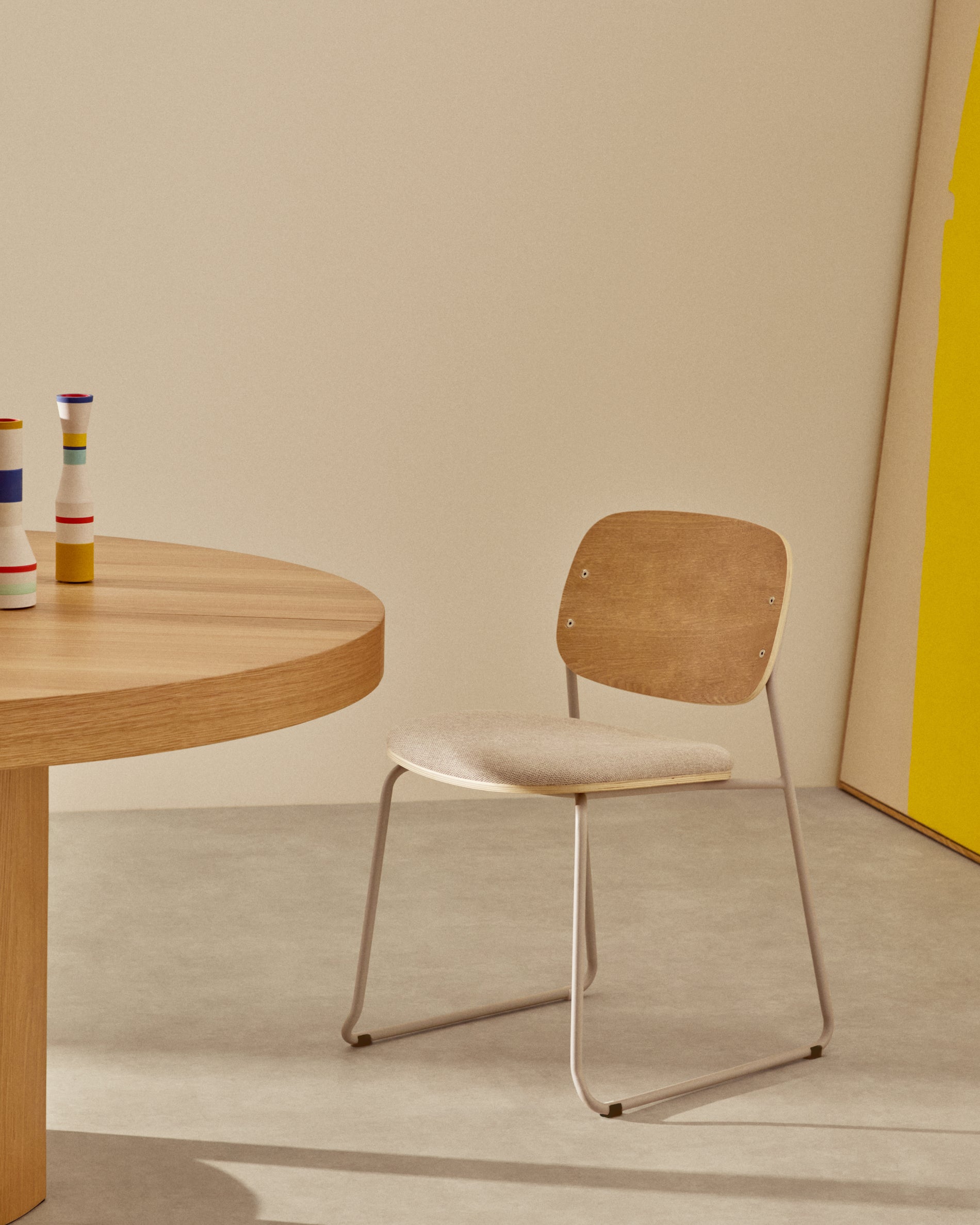 Meli stackable chair in poplar plywood with beige chenille seat and beige metal legs FSC Mix Credit - Lifestyle