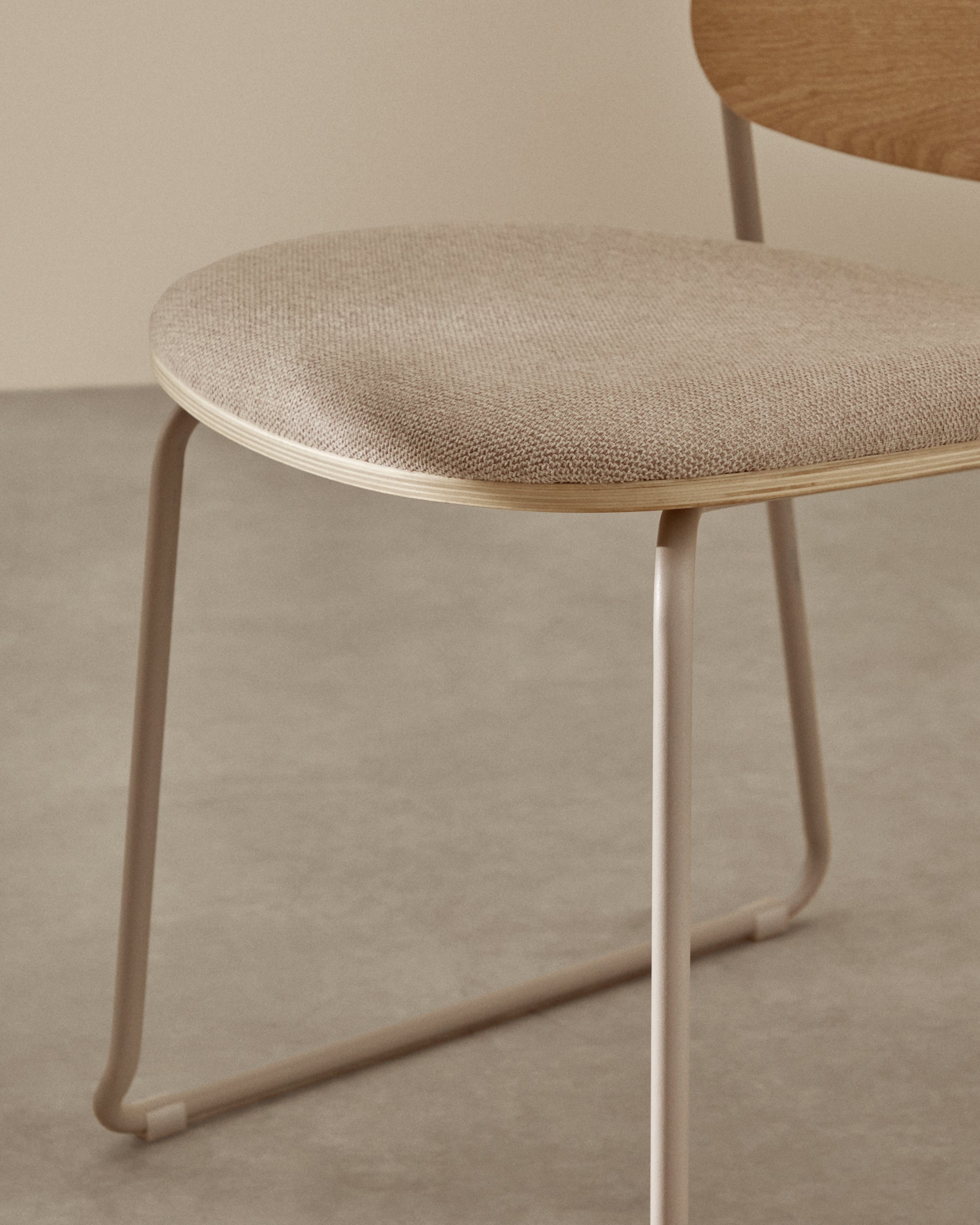Meli stackable chair in poplar plywood with beige chenille seat and beige metal legs FSC Mix Credit