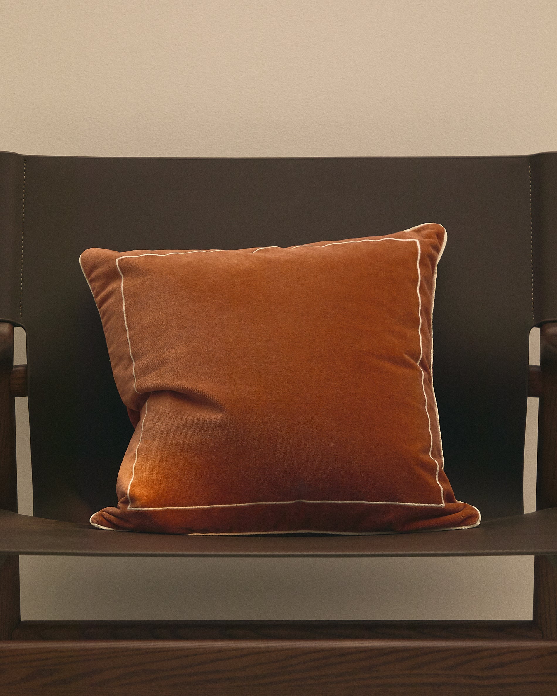 Tivani orange embroidered velvet cushion cover with contrasting trim 45 x 45cm - Lifestyle