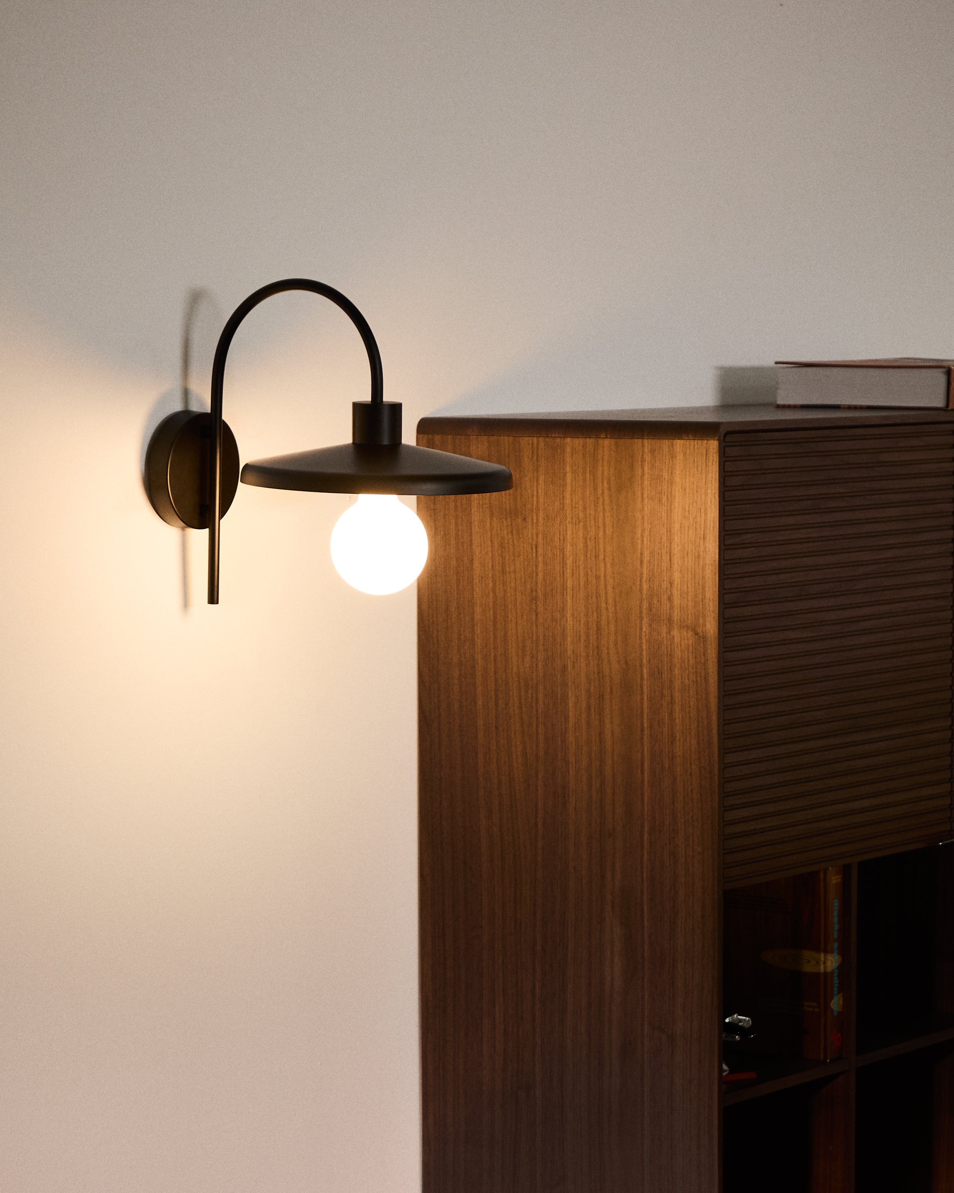 Nuvira wall light in black satin metal - Lifestyle