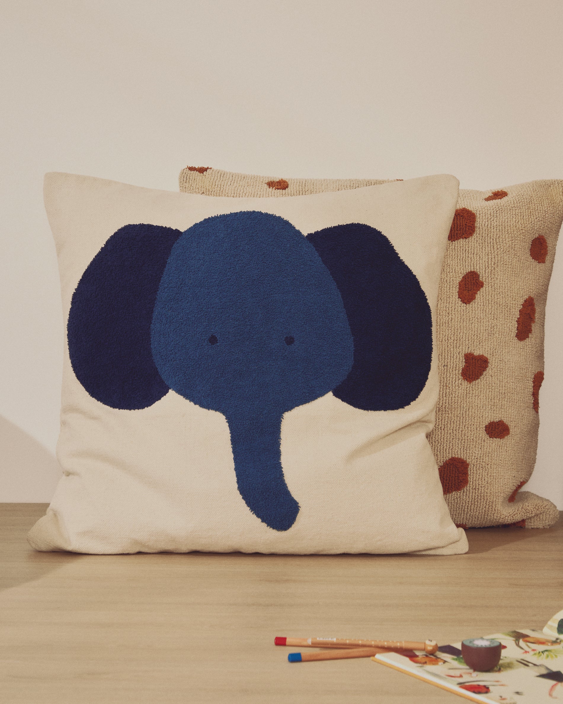 Tandani beige cotton floor cushion with blue elephant 70 x 70cm - Lifestyle