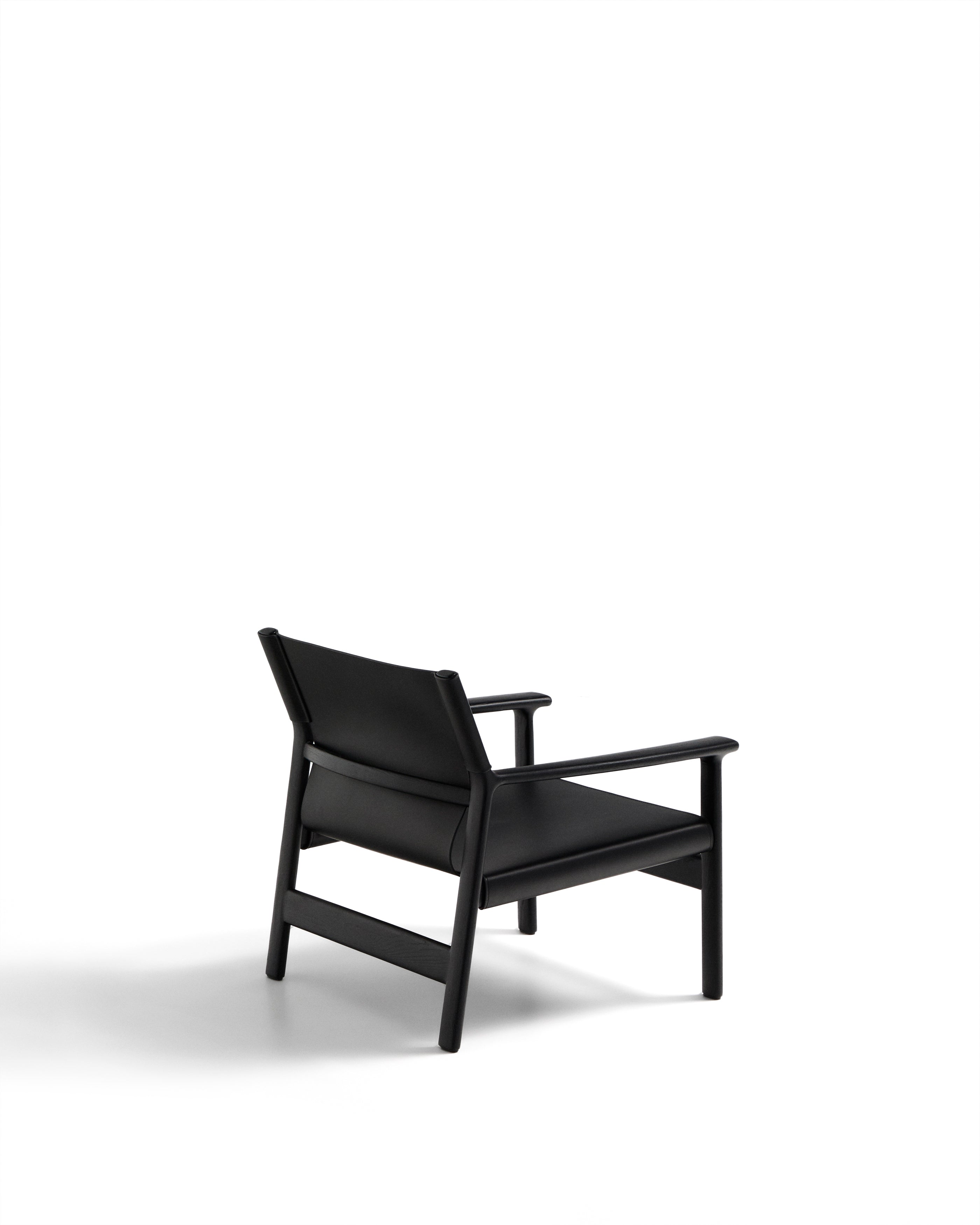 Jan armchair made of black recycled leather fibres and FSC 100% solid ash wood with black finish - Product Image
