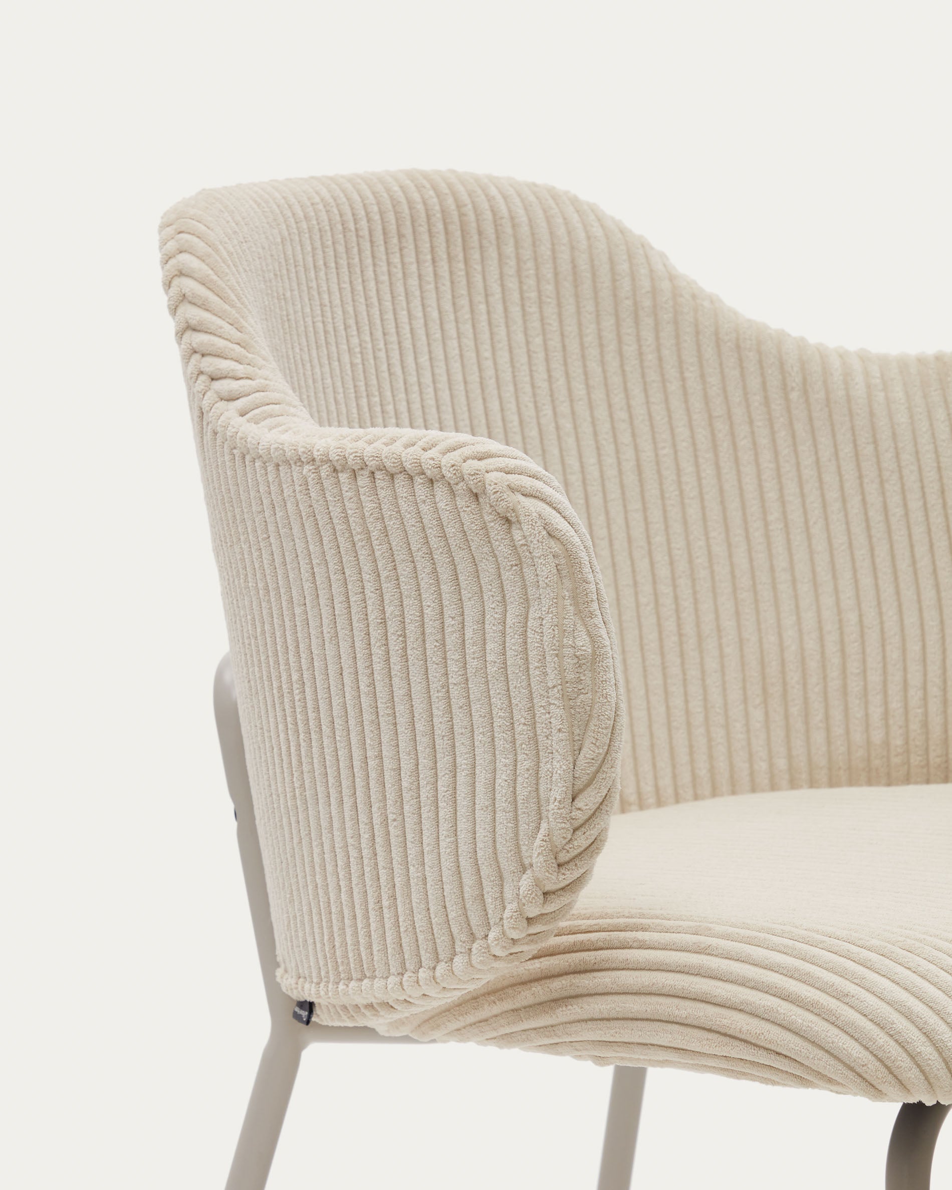 Yunia chair in beige wide seam corduroy with steel legs in a powder coated beige finish FSC 100% - Detail