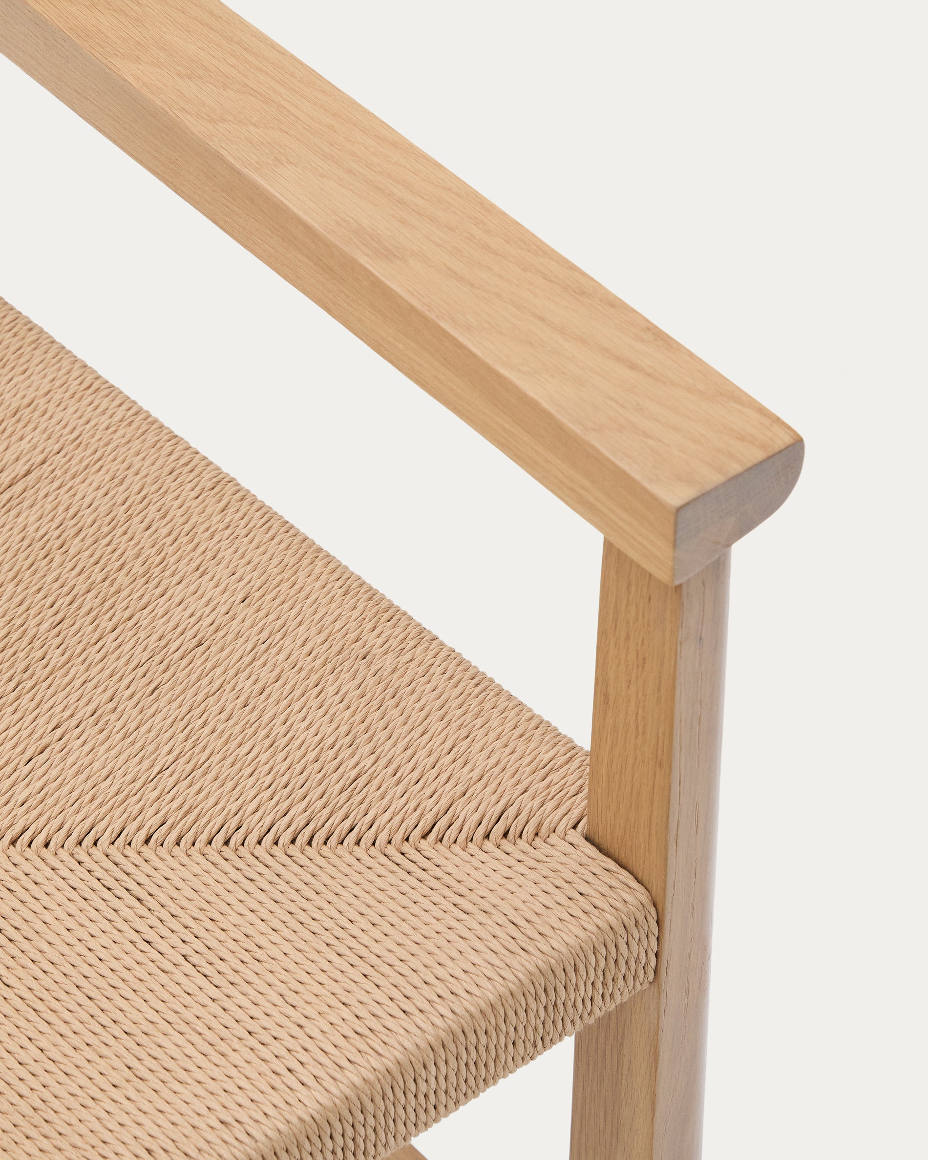 Idun chair made of FSC Mix Credit solid oak wood with natural tone finish and rope cord seat
