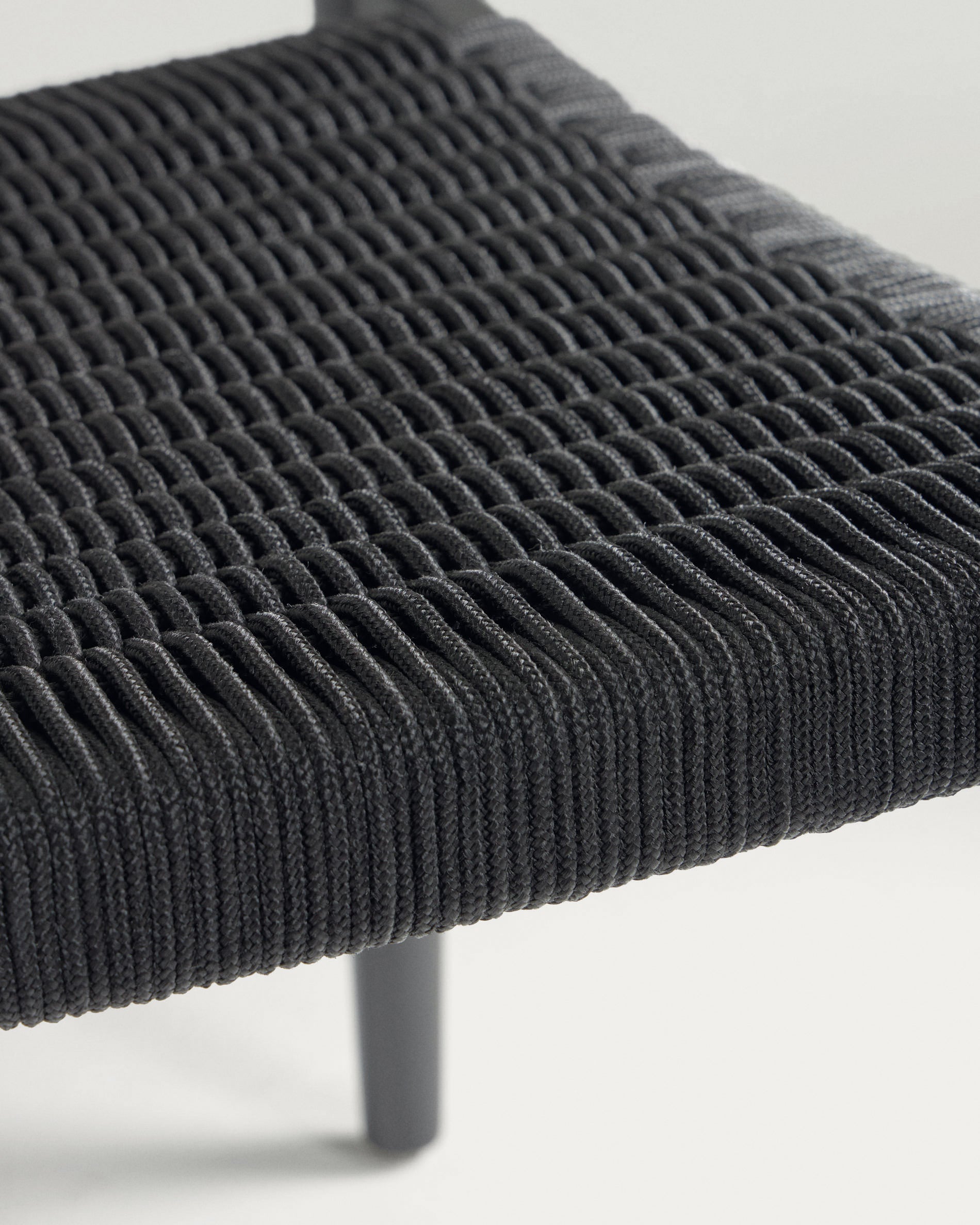 Nina stackable chair in solid acacia wood with black finish and black rope seat FSC 100% - Detail