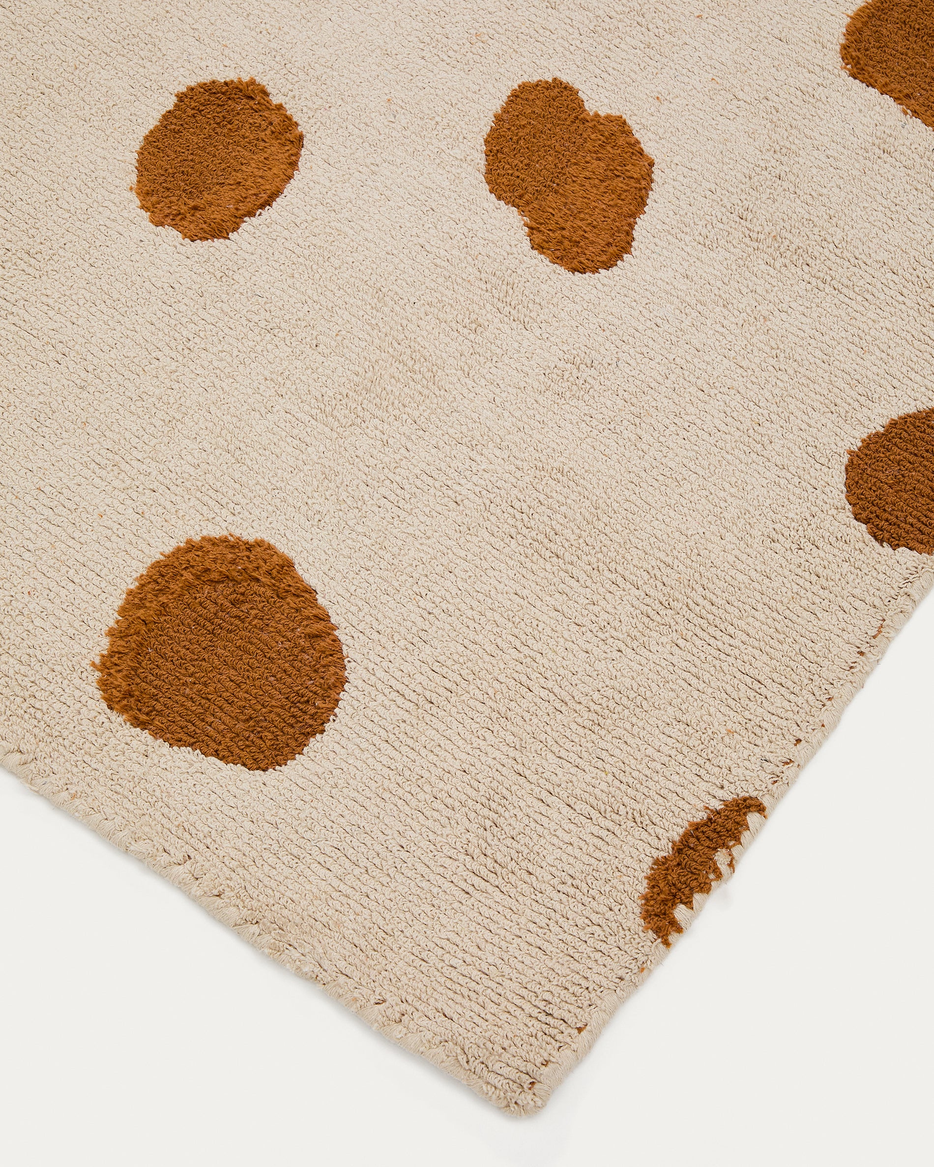 Tandani beige cotton rug with orange cheetah design 90 x 150cm - Detail