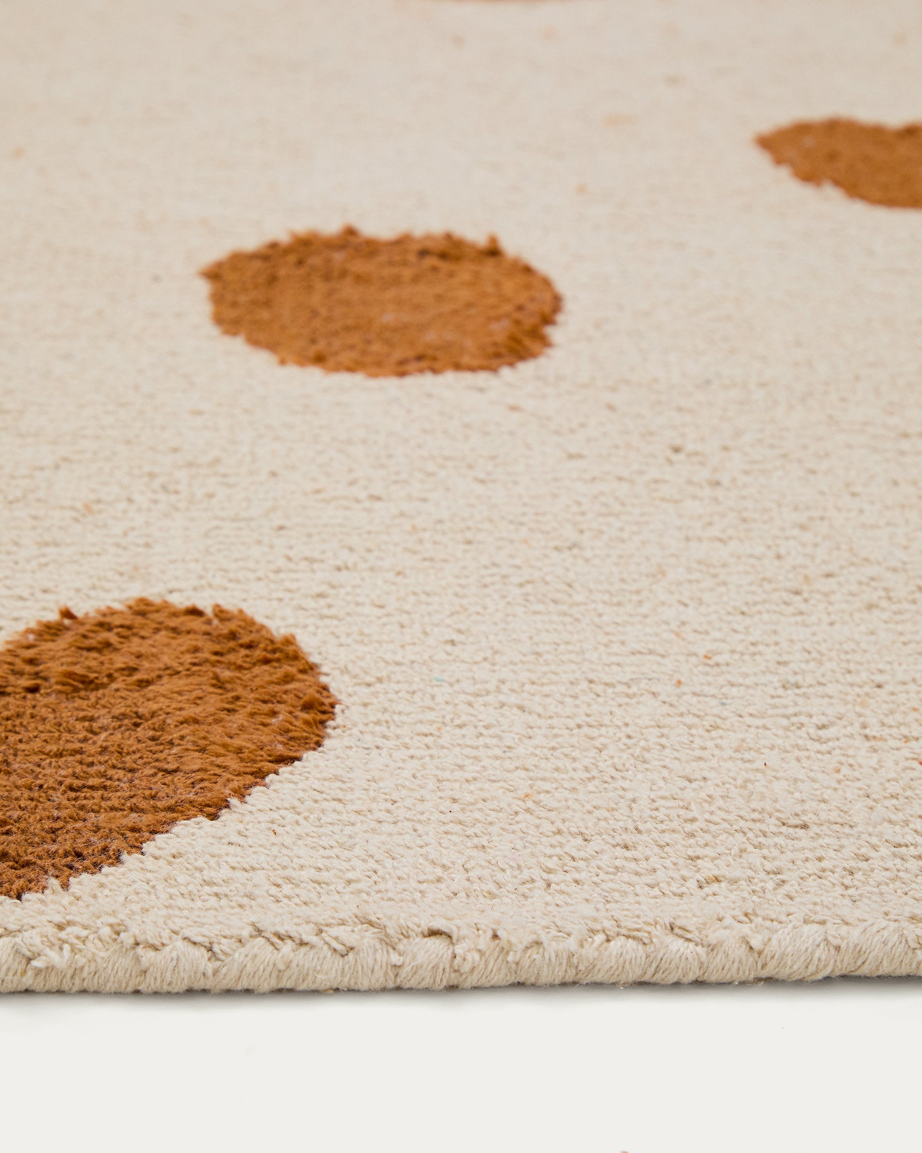 Tandani beige cotton rug with orange cheetah design 90 x 150cm - Detail