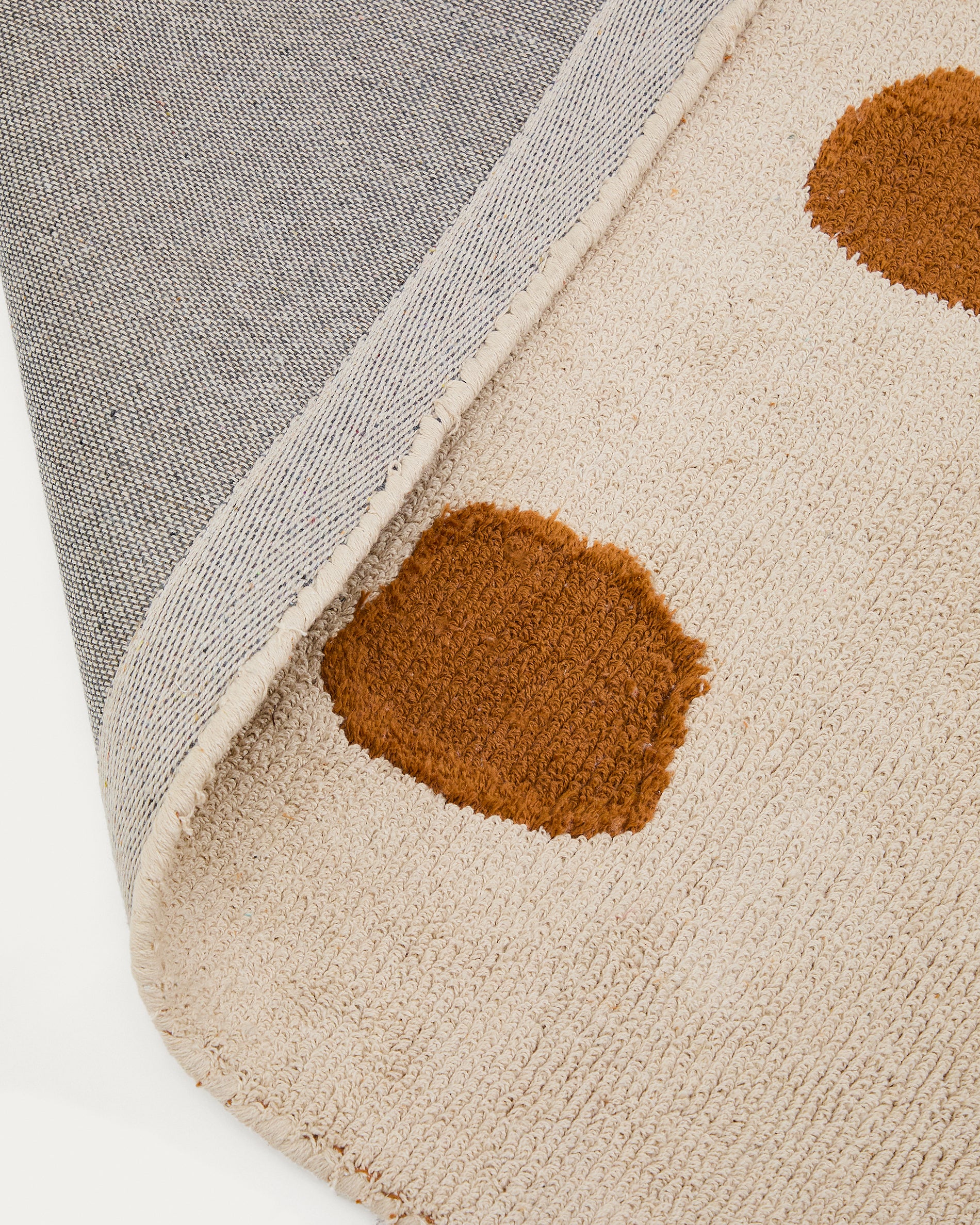 Tandani beige cotton rug with orange cheetah design 90 x 150cm - Detail
