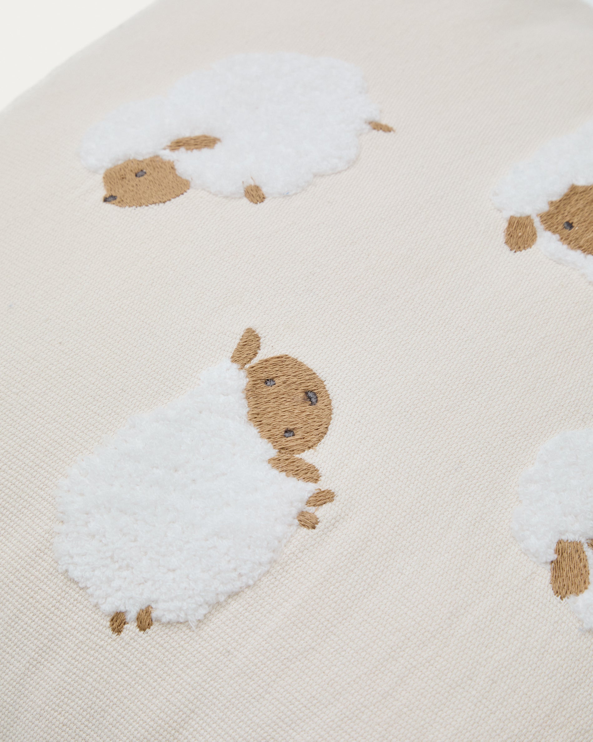 Milu cushion cover in beige cotton with sheep embroidery feature, 45 x 45 cm - Detail