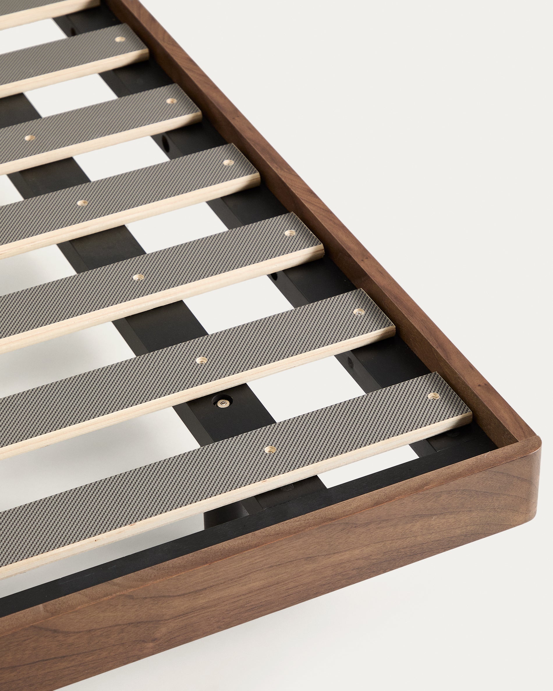 Norlen bed base in walnut veneer with dark finish for 160 x 200cm mattress FSC Mix Credit - Detail