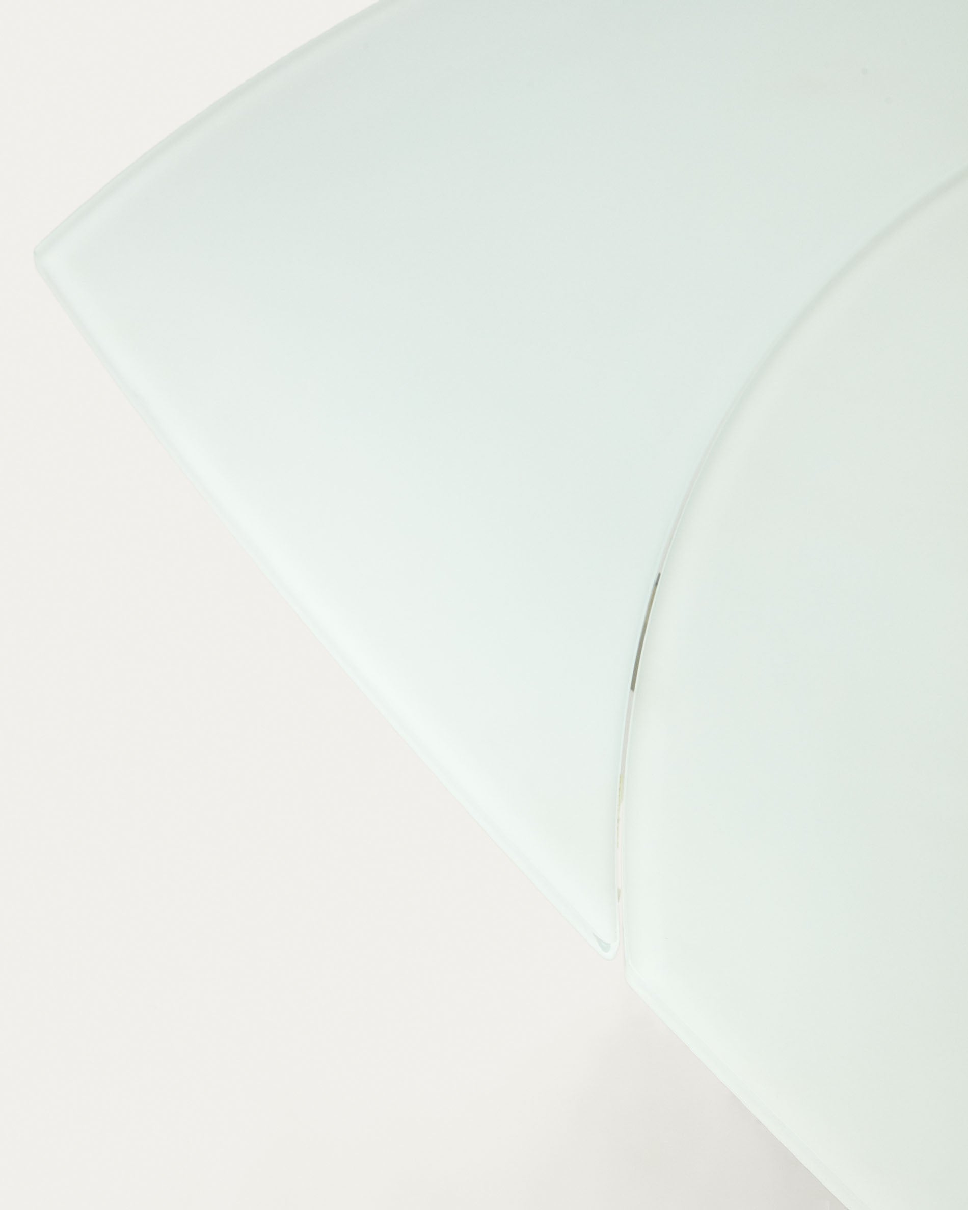 Yodalia extendable round table in glass and MDF with steel legs in white, 130 (190) x 100 cm - Detail