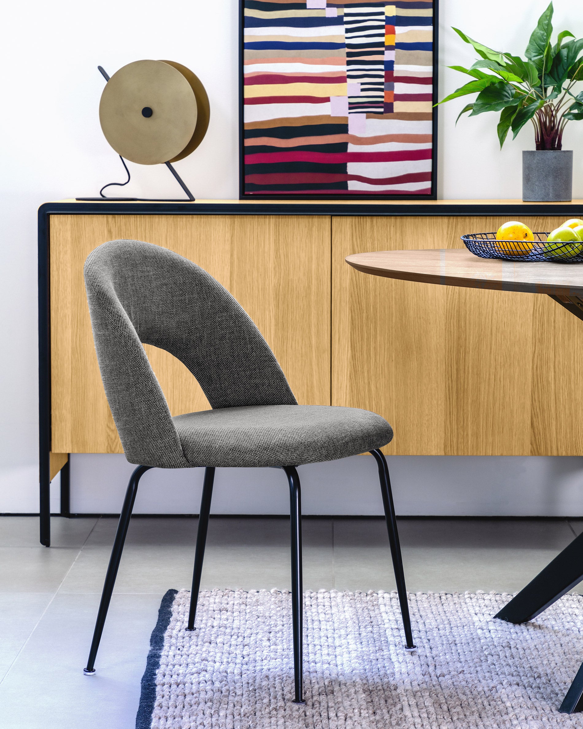 Mahalia dining chair in dark grey with steel legs, with a black painted finish FSC 100% - Lifestyle
