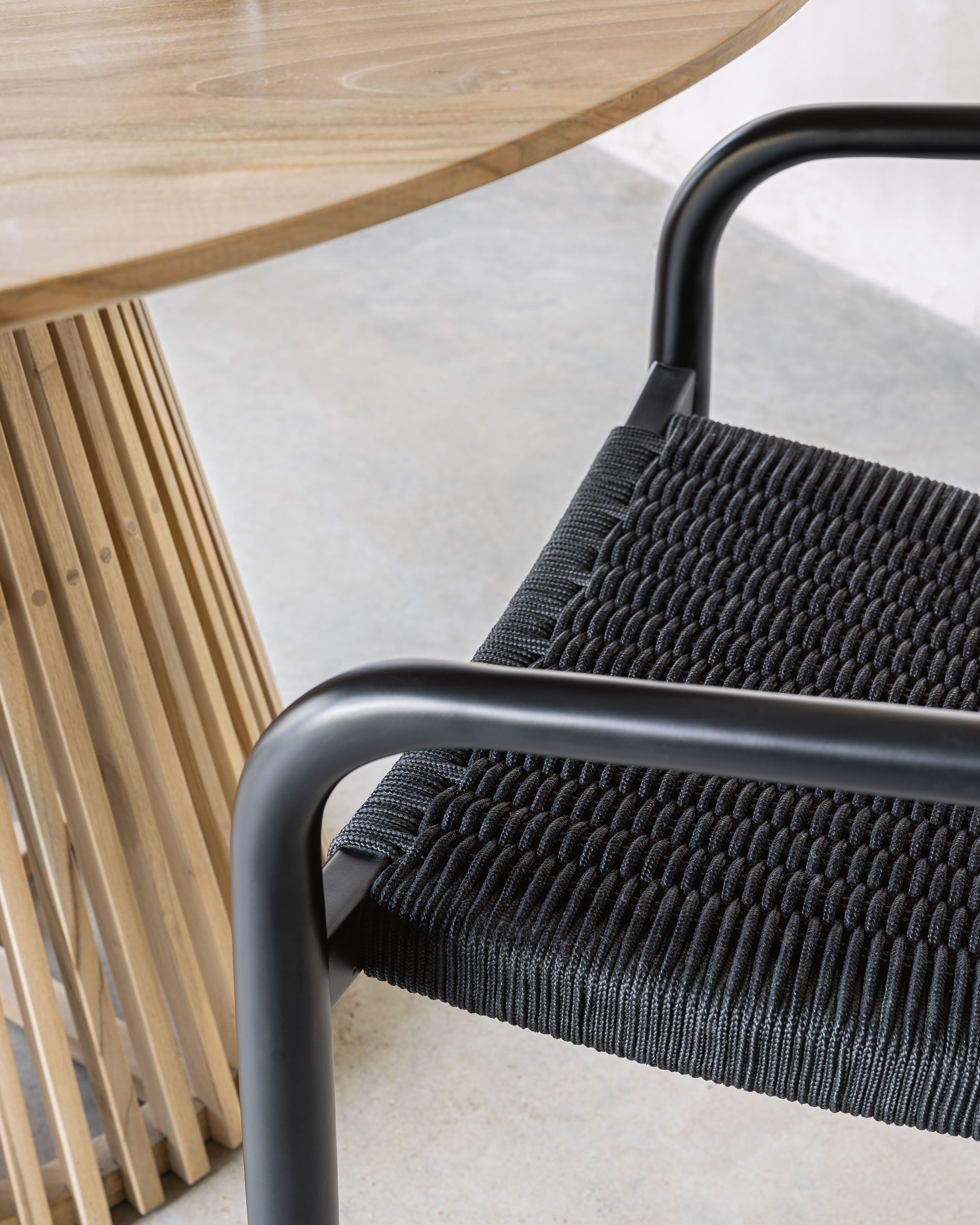 Nina stackable chair in solid acacia wood with black finish and black rope seat FSC 100% - Lifestyle