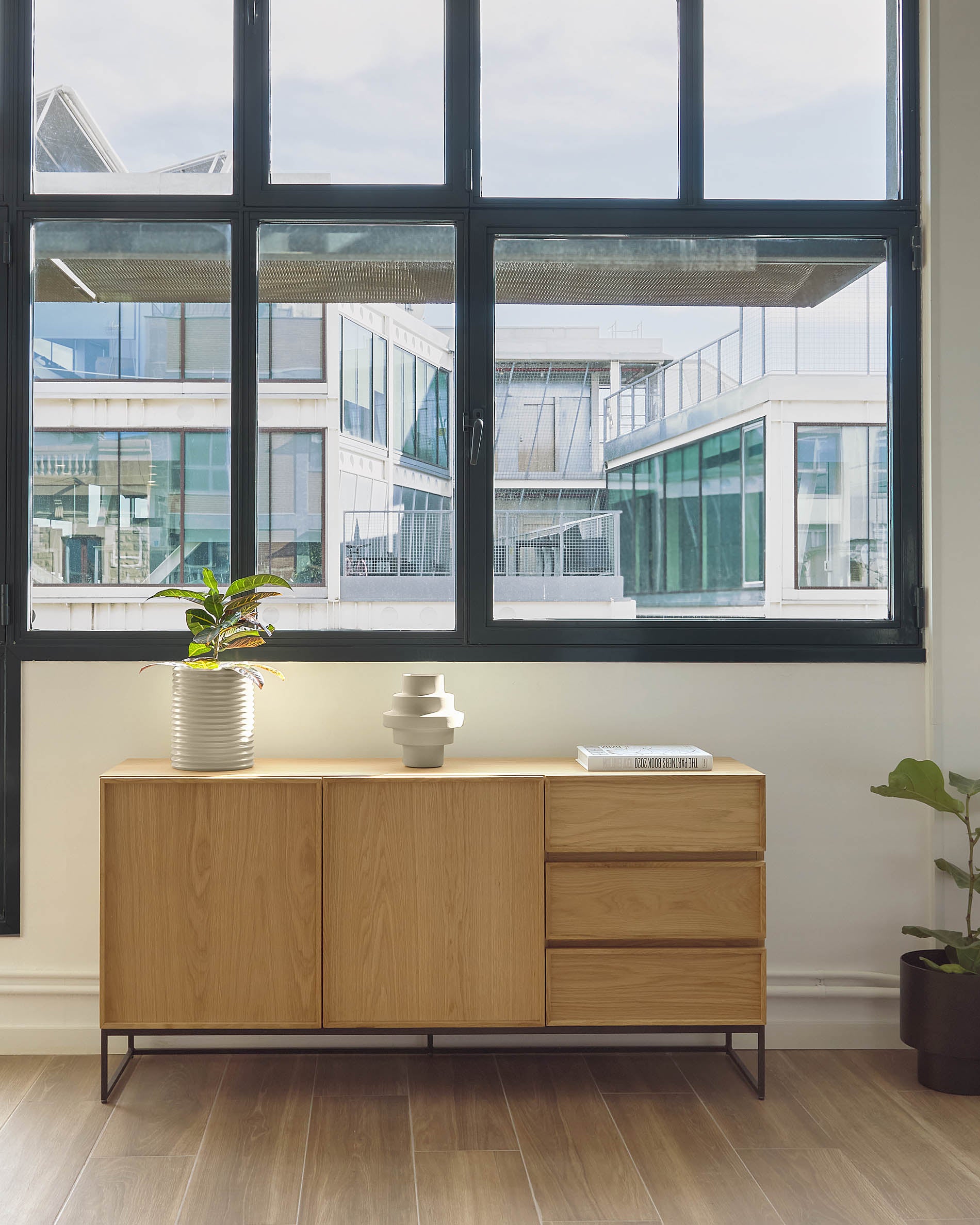 Taiana 2 door 3 drawer sideboard in oak veneer with black steel structure, 160 x 78 cm - Lifestyle