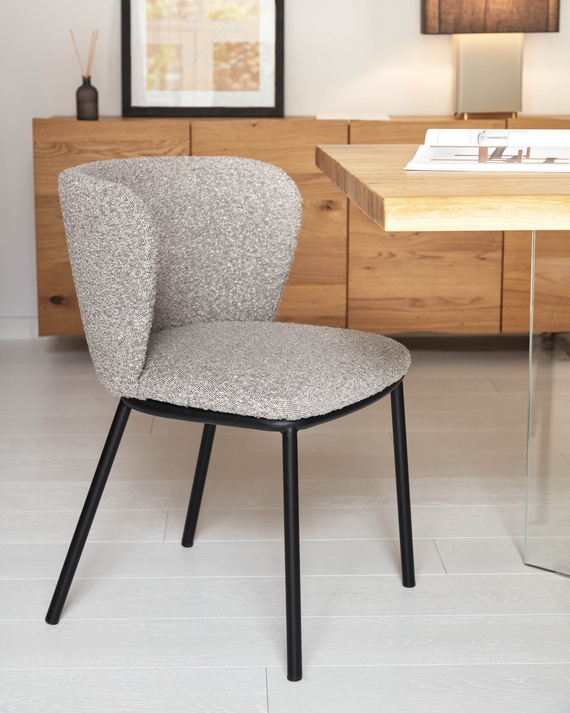 Ciselia chair with light grey bouclé and steel legs with black finish FSC Mix Credit - Lifestyle
