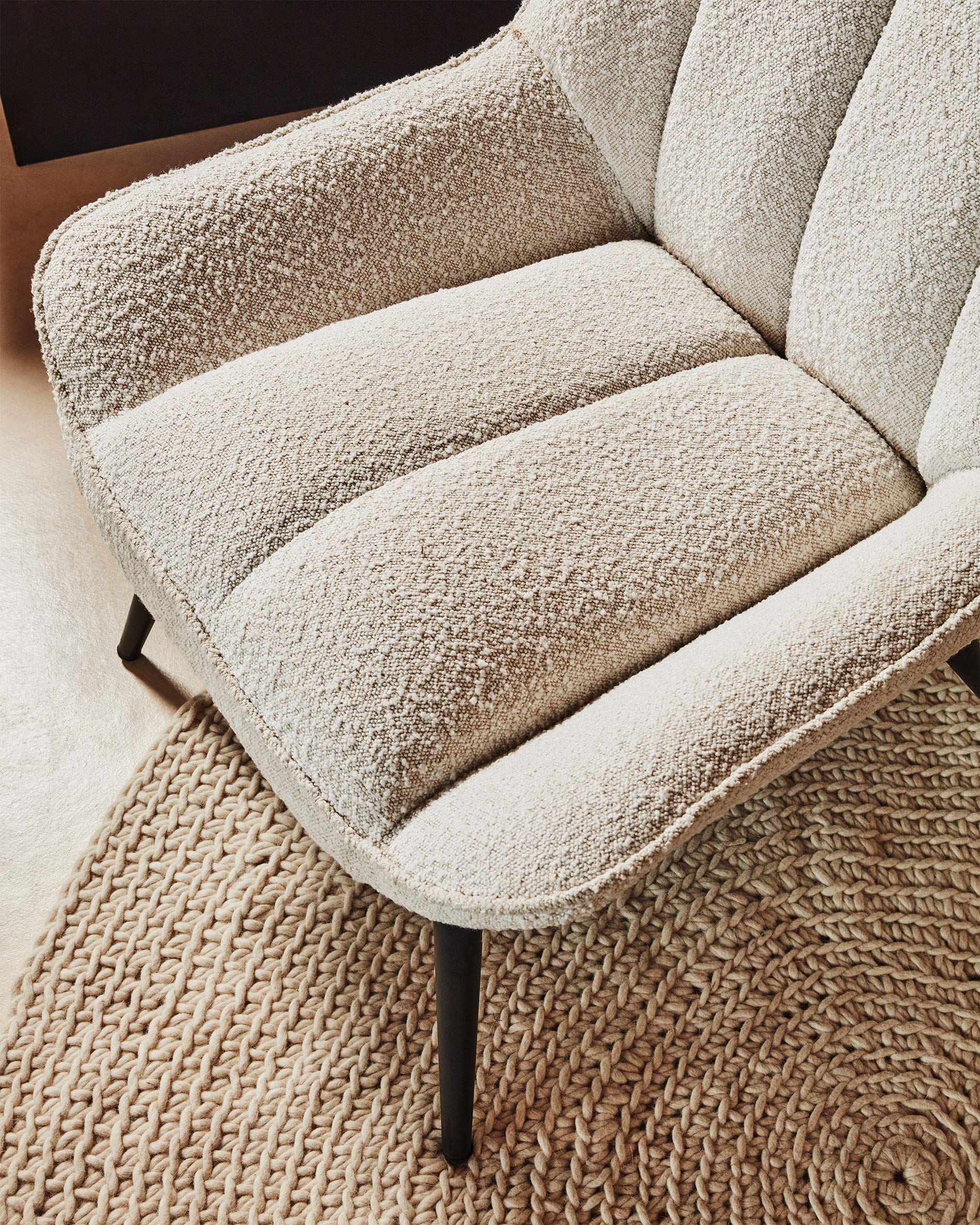Marlina white bouclé armchair with steel legs with black painted finish - Lifestyle