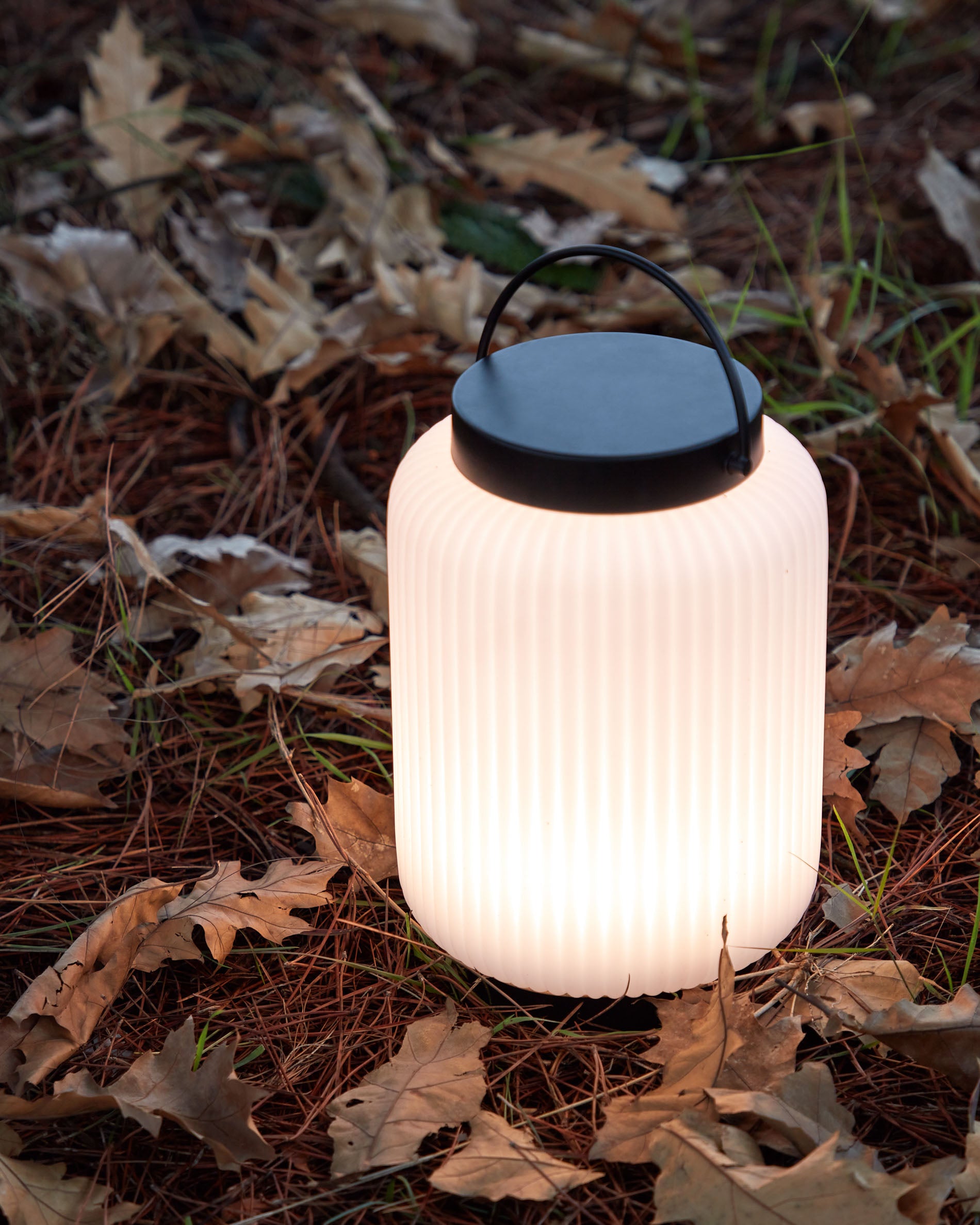 Verona outdoor table lamp in polythene and metal with black finish - Lifestyle