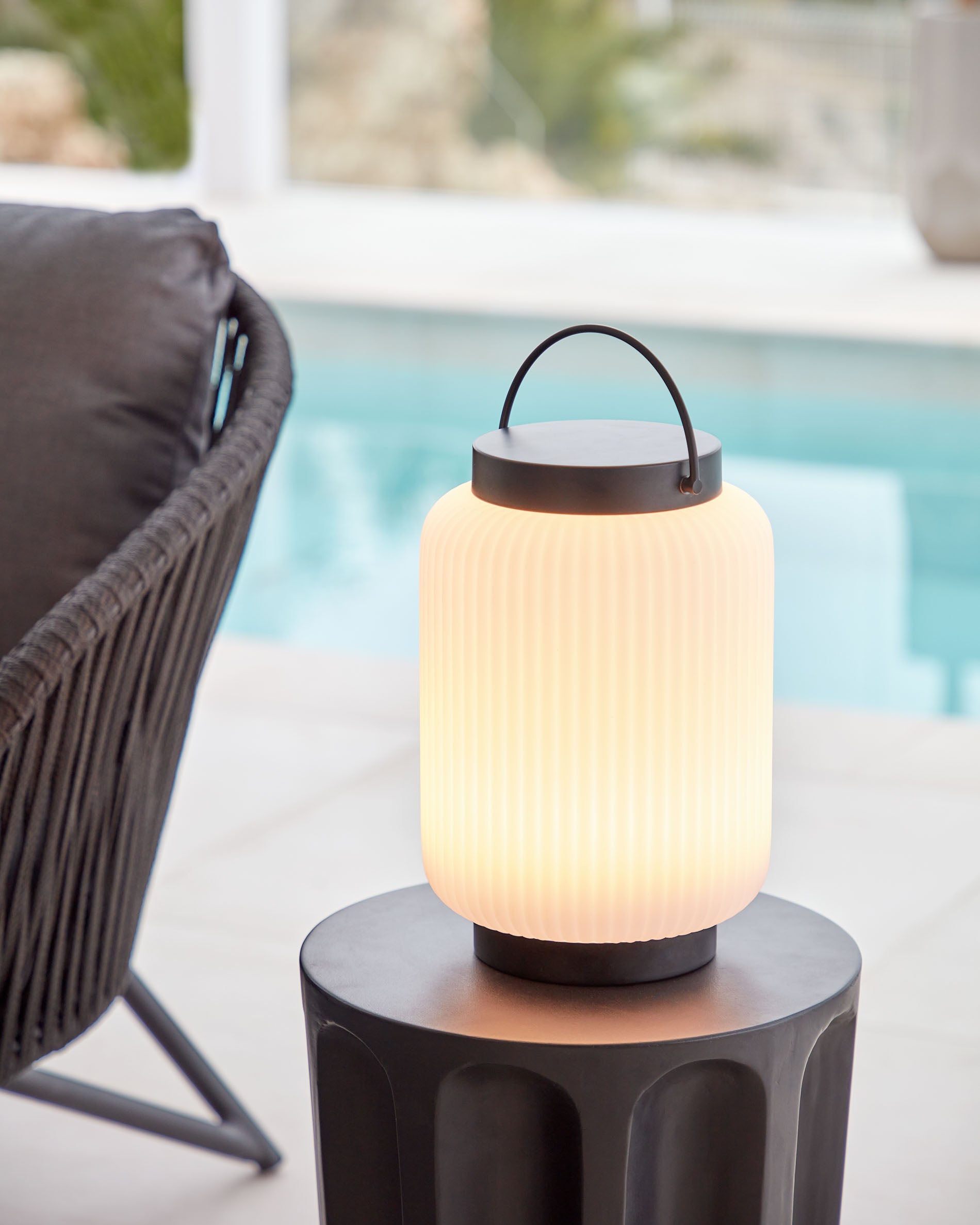 Verona outdoor table lamp in polythene and metal with black finish - Lifestyle