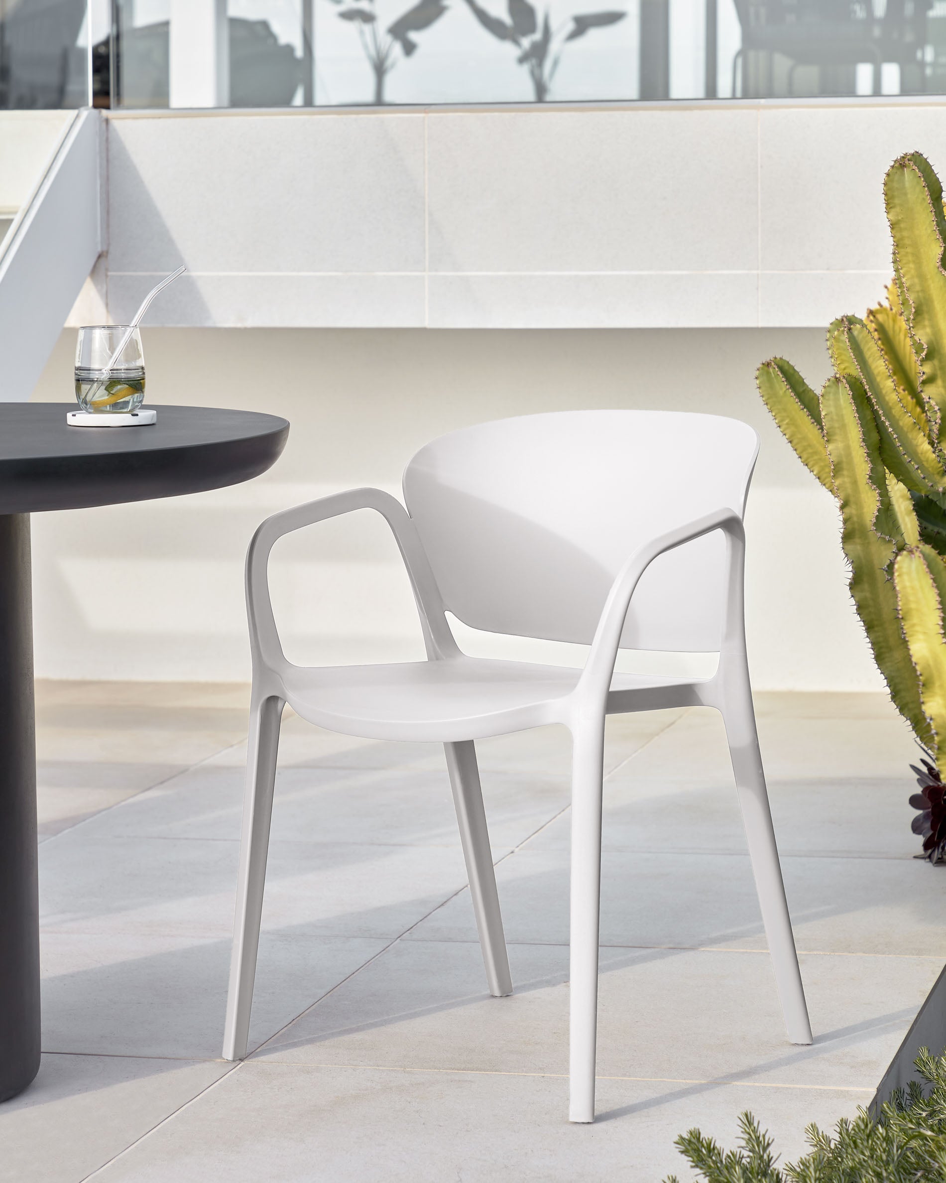 Ania stackable white garden chair - Lifestyle