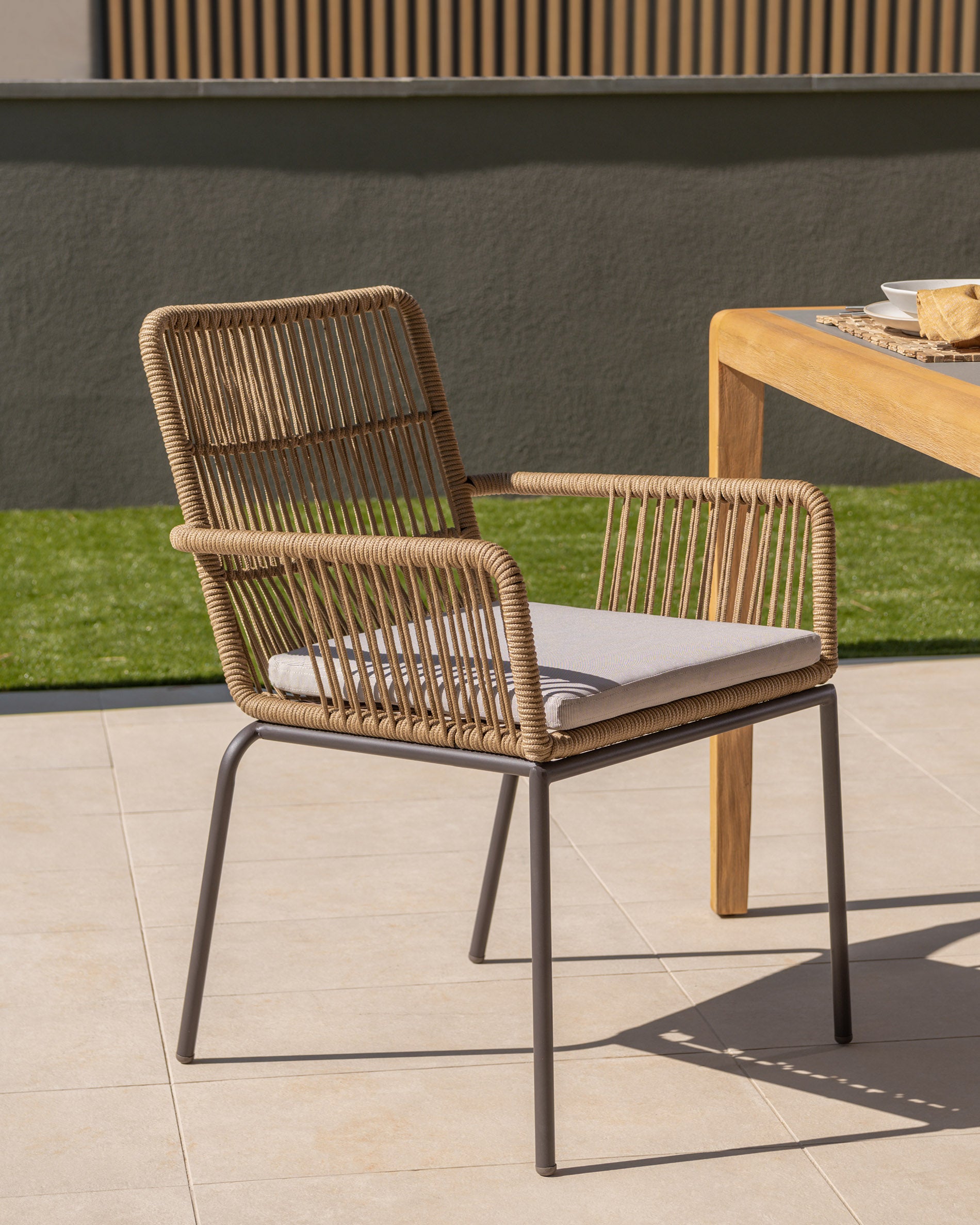 Samanta stackable chair made from beige cord and galvanised steel legs. - Lifestyle