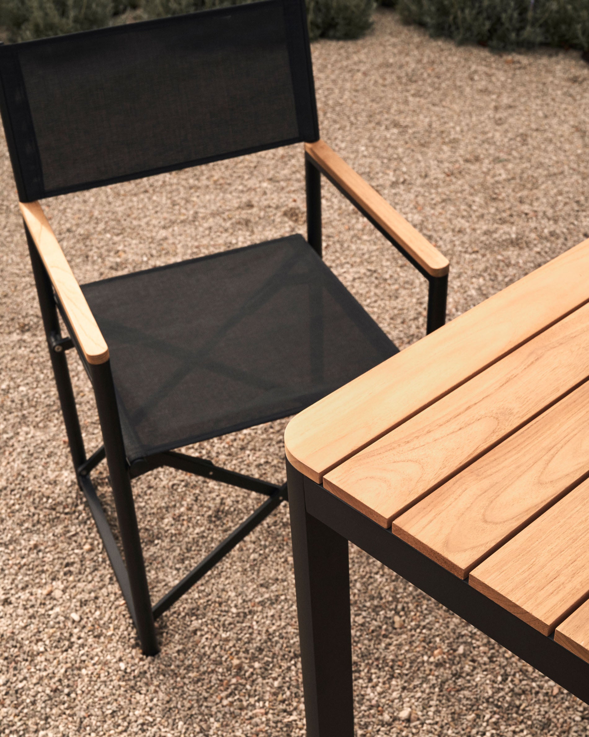 Llado black aluminium folding chair with solid teak armrests 100% outdoor suitable - Lifestyle