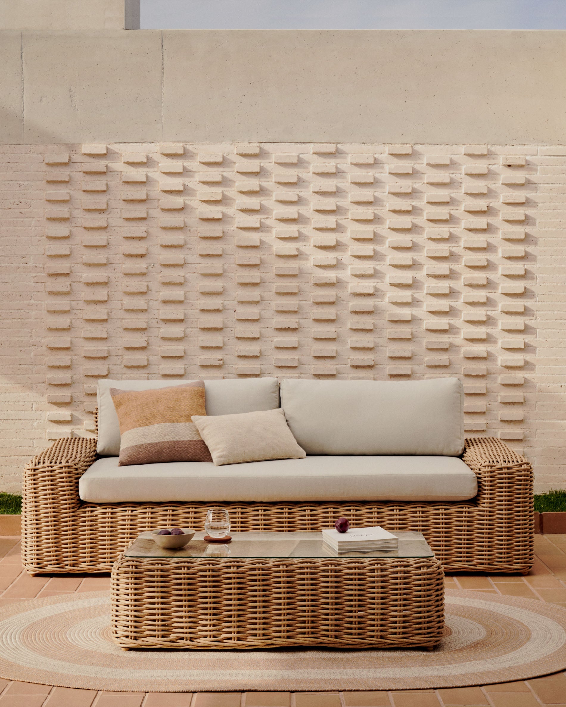 Portlligat 3 seater faux rattan outdoor sofa in a natural finish - Lifestyle