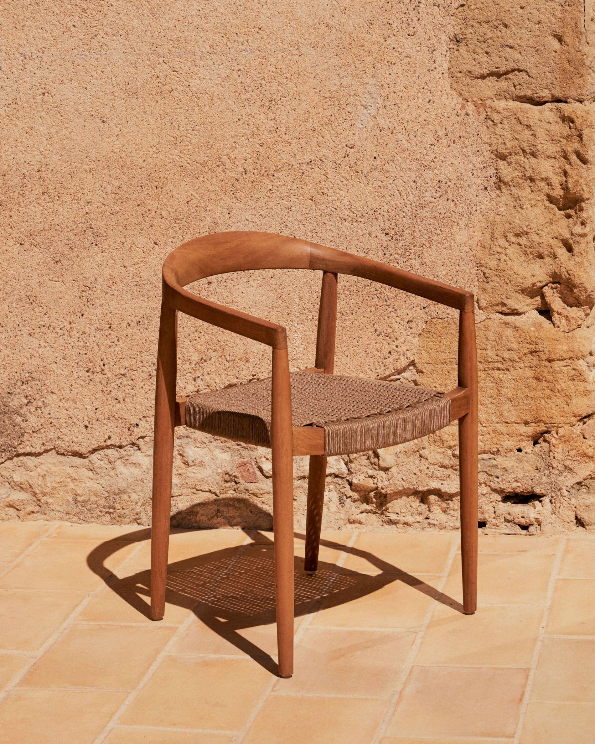 Ydalia stackable outdoor chair in solid teak wood with natural finish and beige rope - Lifestyle