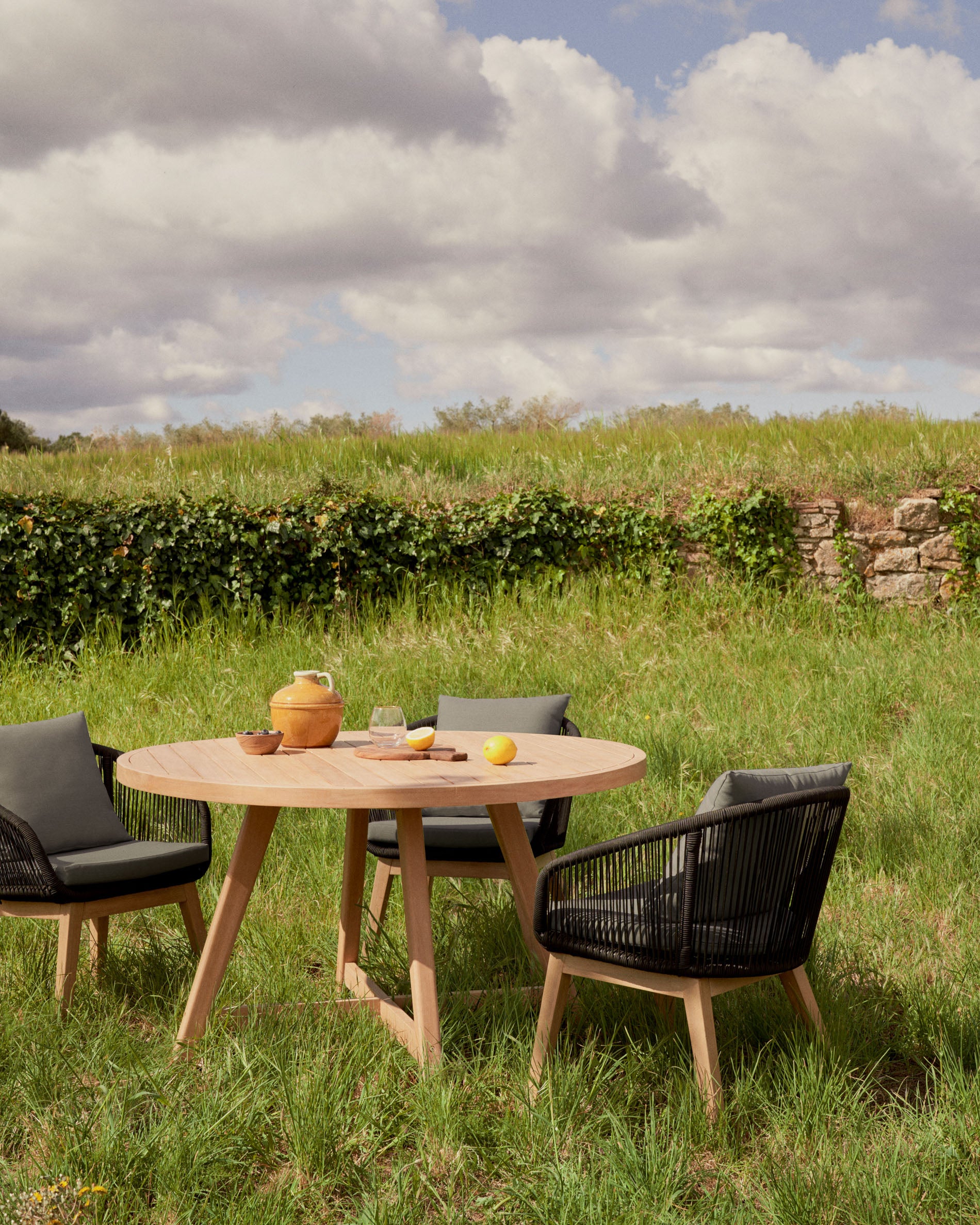 Portalo chair in black cord with solid acacia wood legs - Lifestyle
