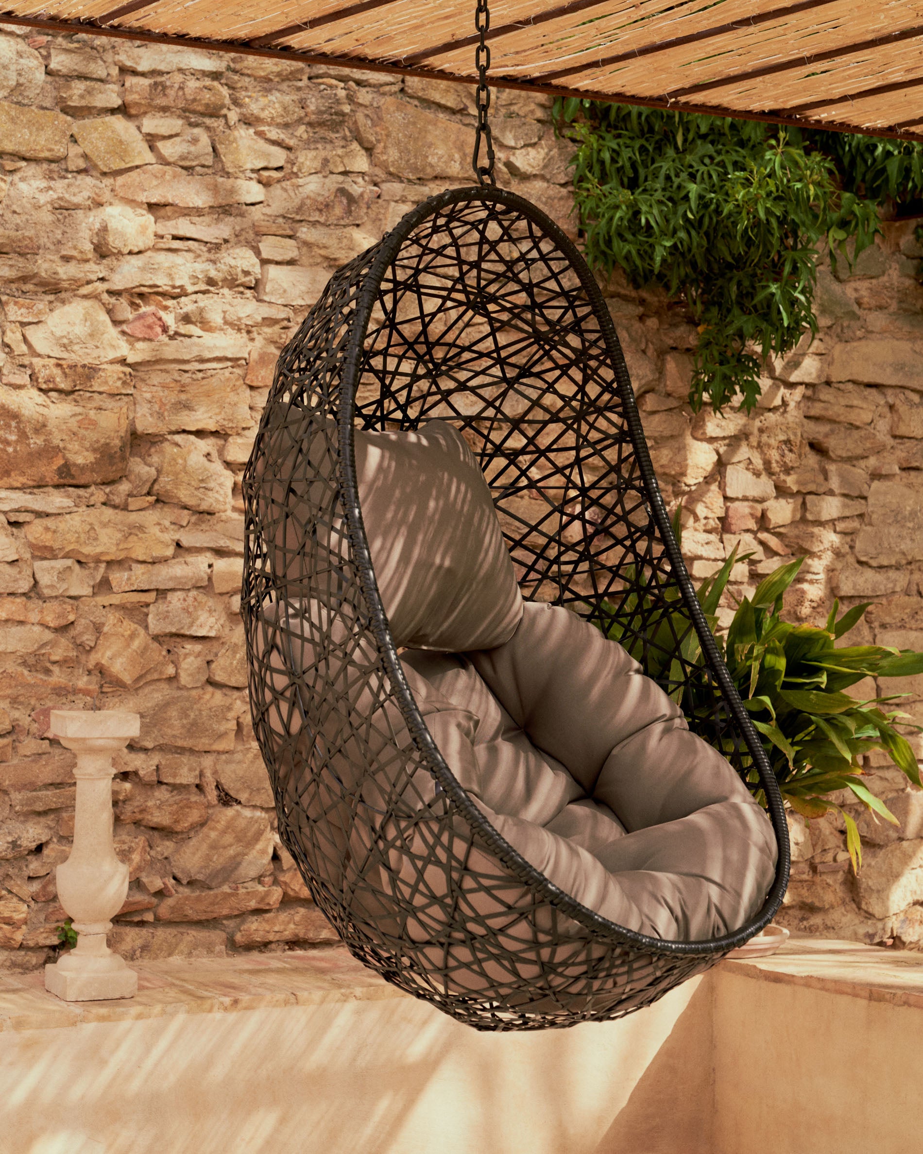 Florina hanging chair in dark grey - Lifestyle