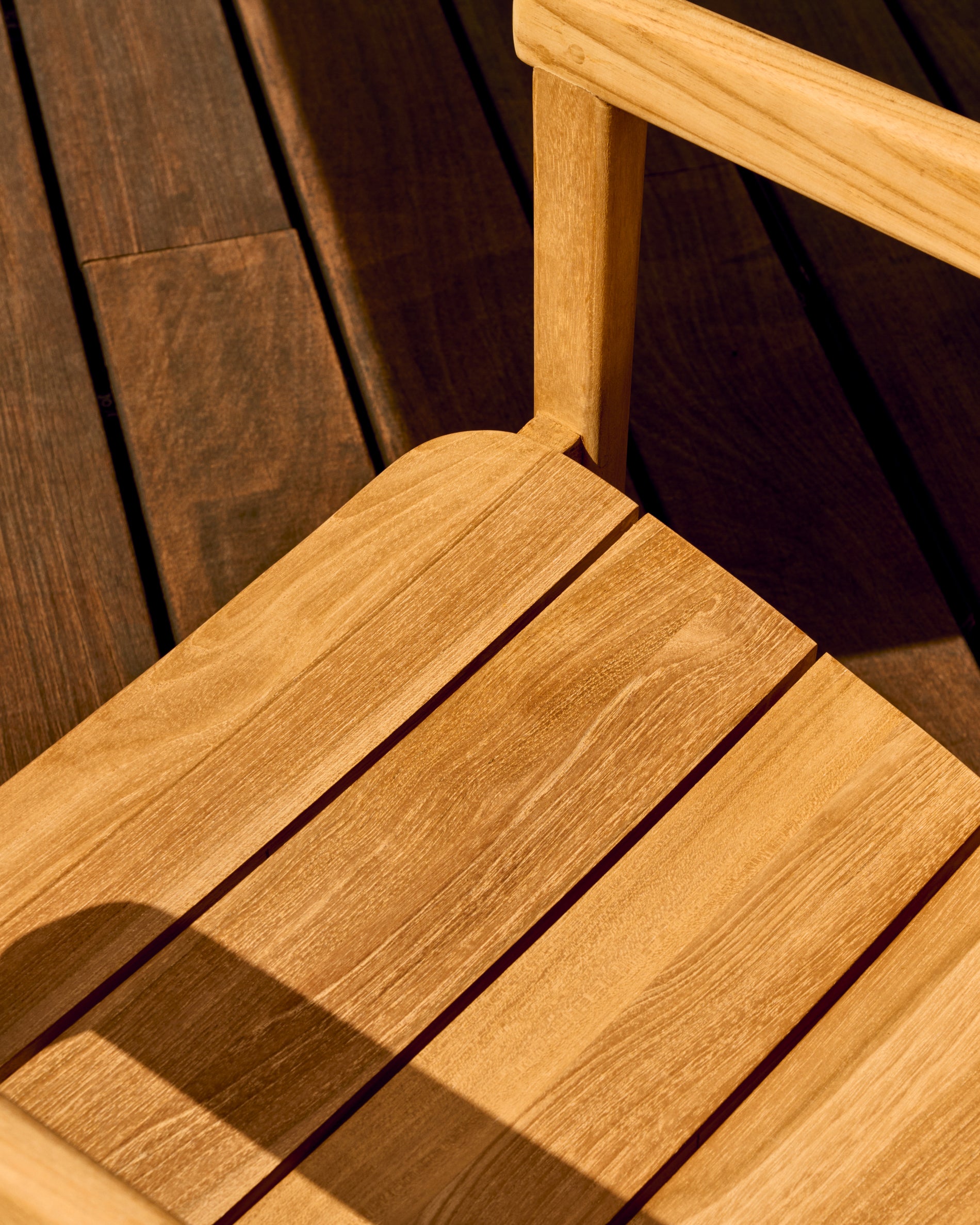 Icaro stackable solid teak wood chair in a natural finish, FSC 100% - Lifestyle