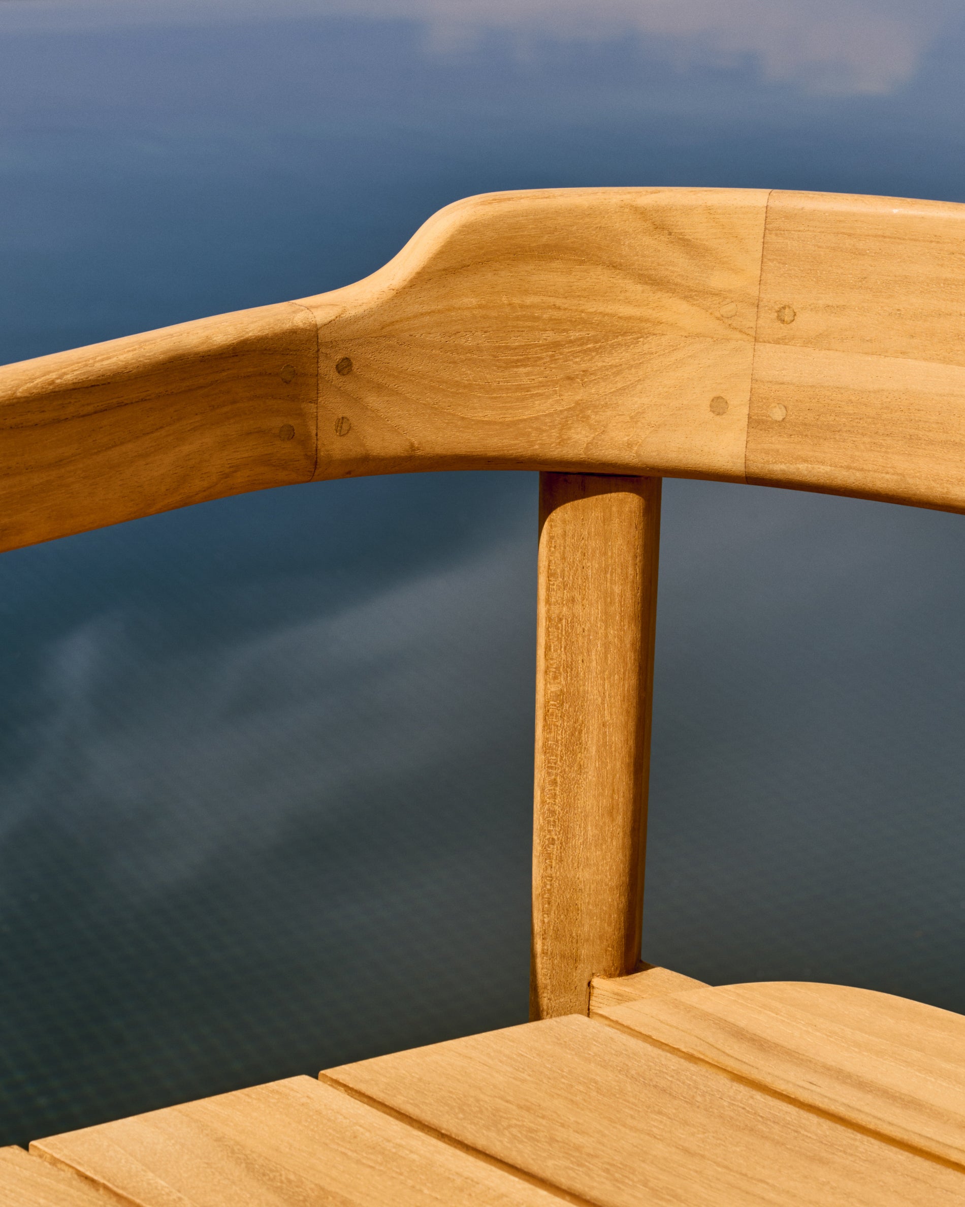 Icaro stackable solid teak wood chair in a natural finish, FSC 100% - Lifestyle