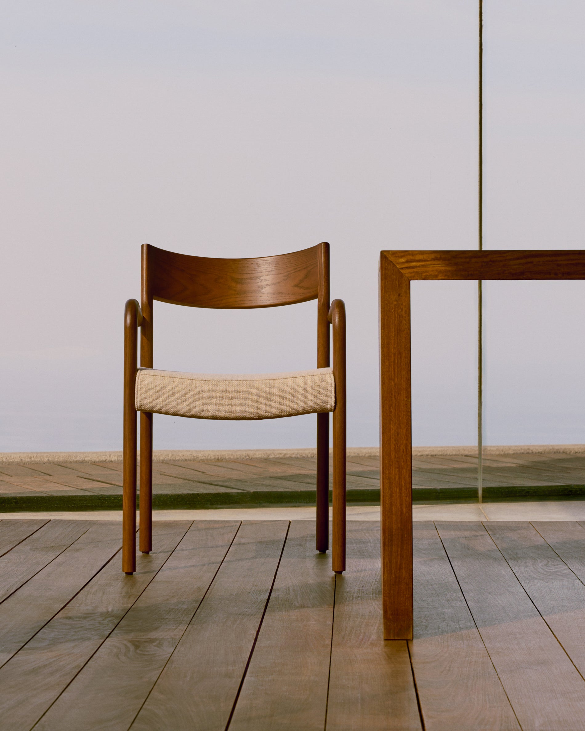 Falconera chair with a removable cover in solid oak wood with walnut finish FSC Mix Credit - Lifestyle