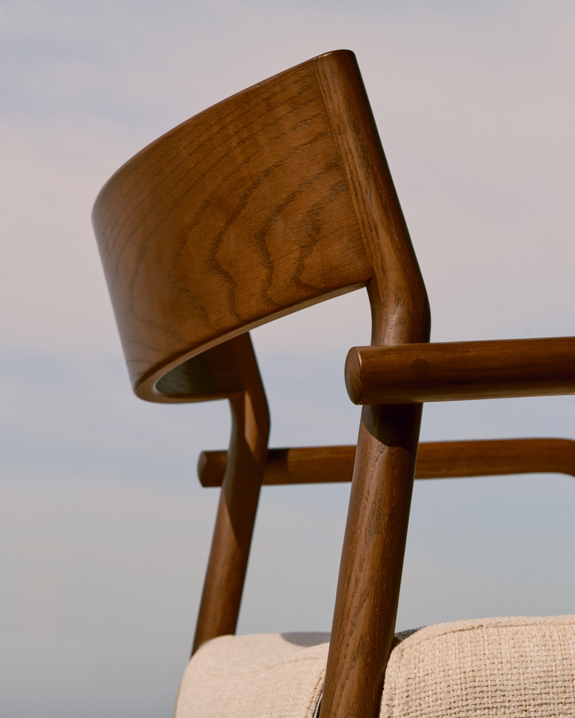 Falconera chair with a removable cover in solid oak wood with walnut finish FSC Mix Credit - Lifestyle