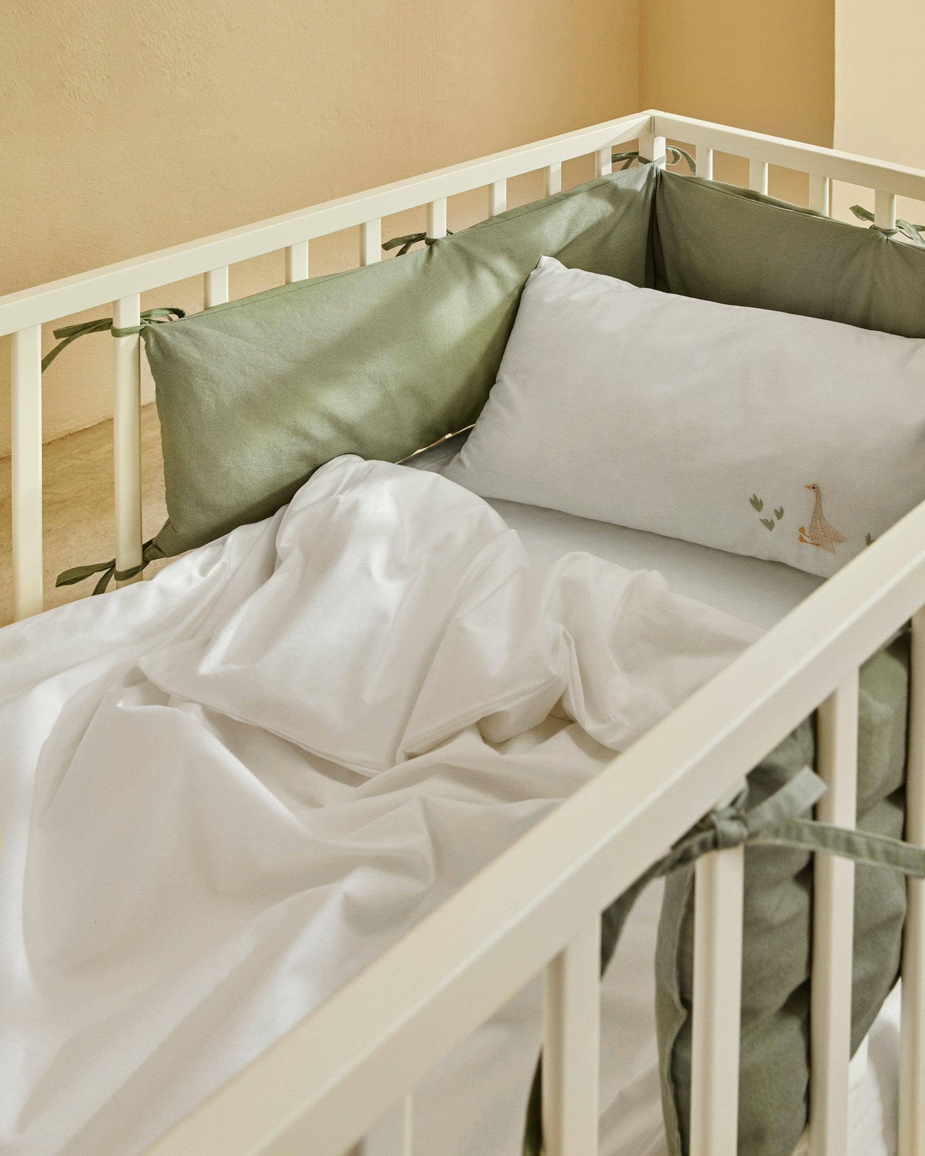 Milu set of duvet cover and pillow cases with embroidered goose for convertible cot and bed 70 x 140 cm - Lifestyle