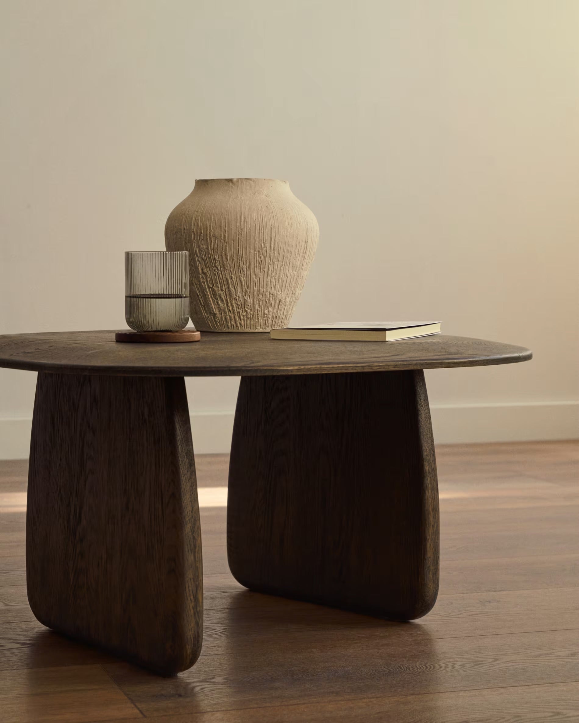 Pirita side table made of solid oak, with a dark finish, 70.6 x 70 cm, 100% FSC certified.