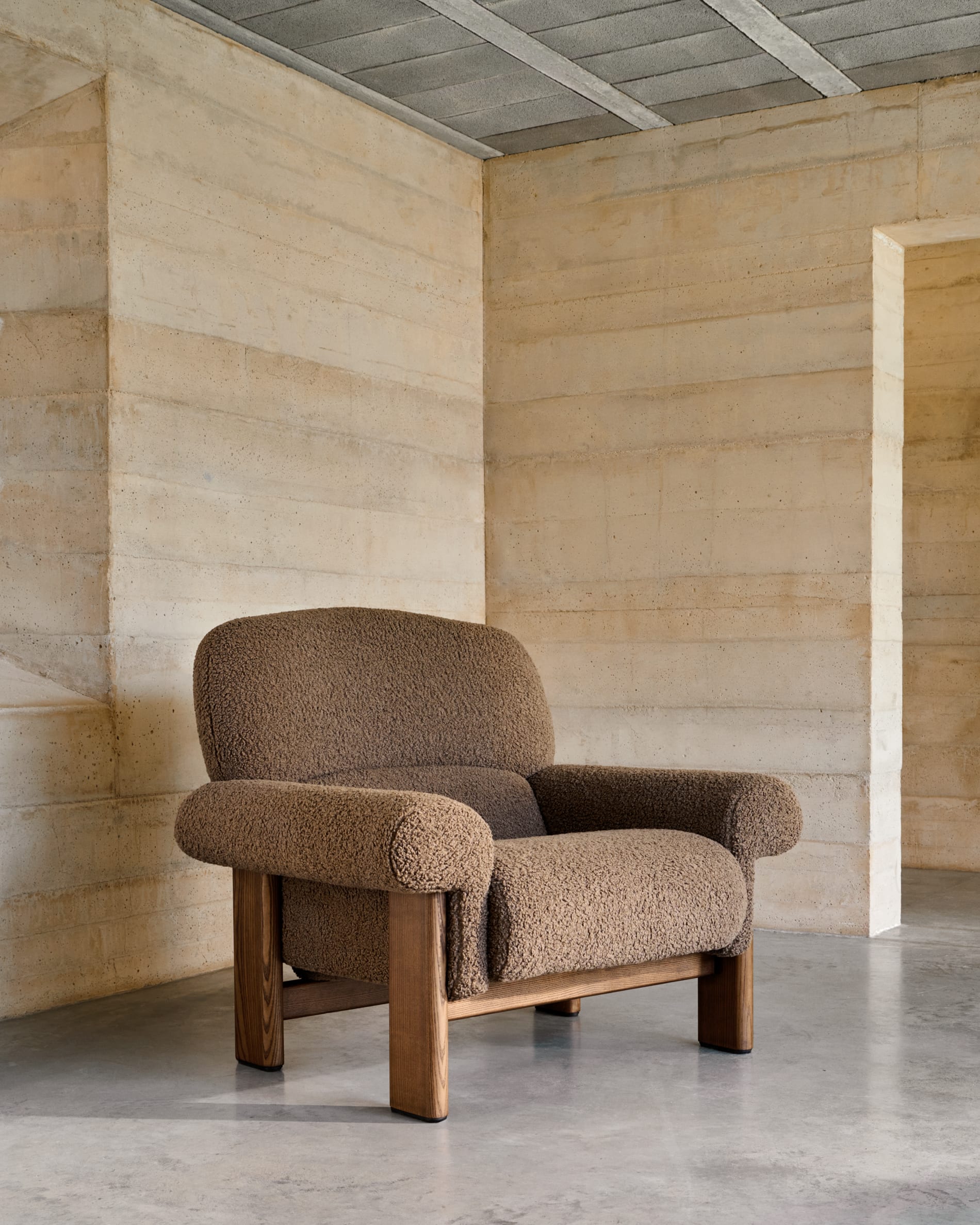 Cabana armchair in ocher bouclé, solid ash wood legs, walnut finish, FSC 100%