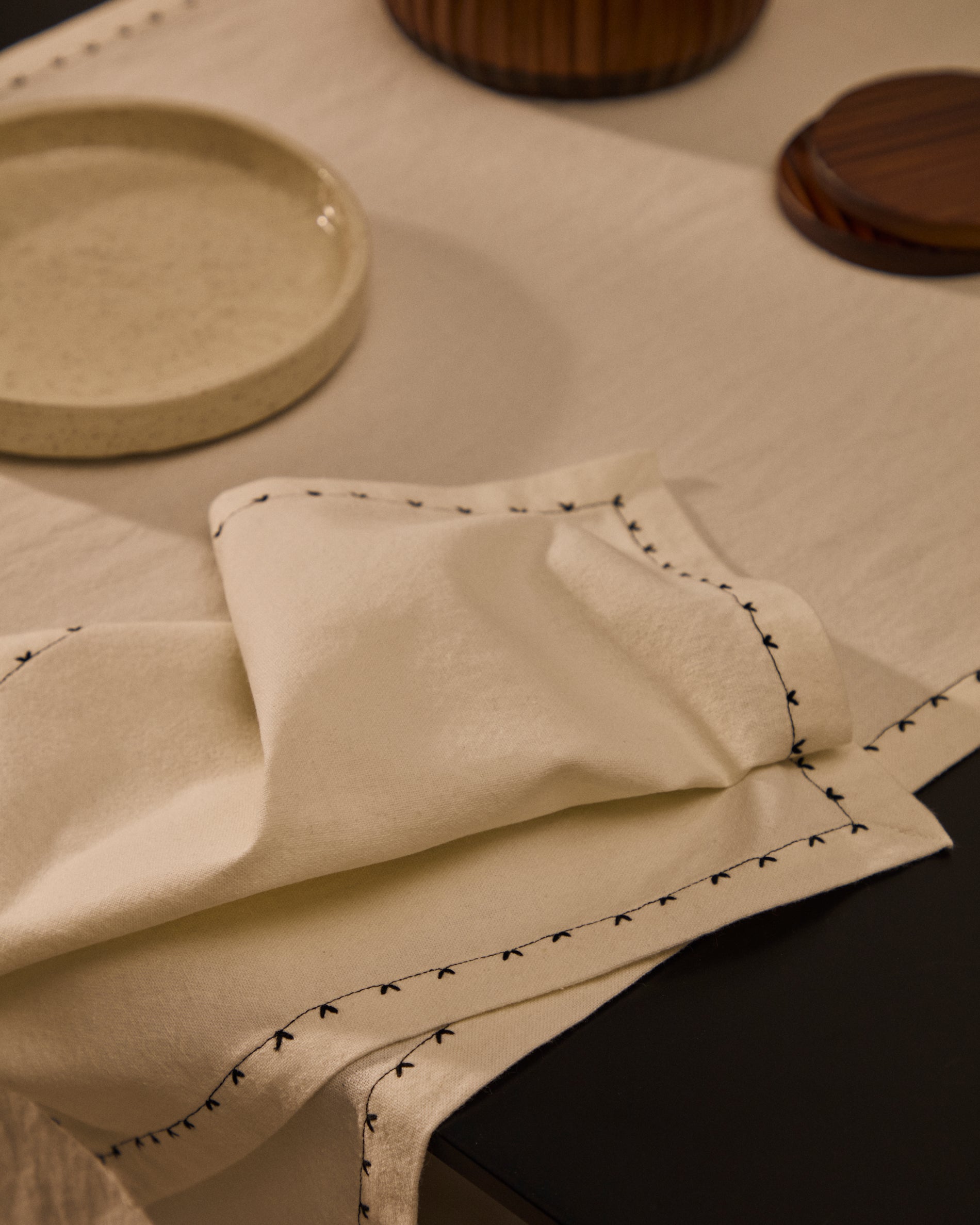 Olim set of two beige, 100% cotton napkins with black embroidery detail - Lifestyle